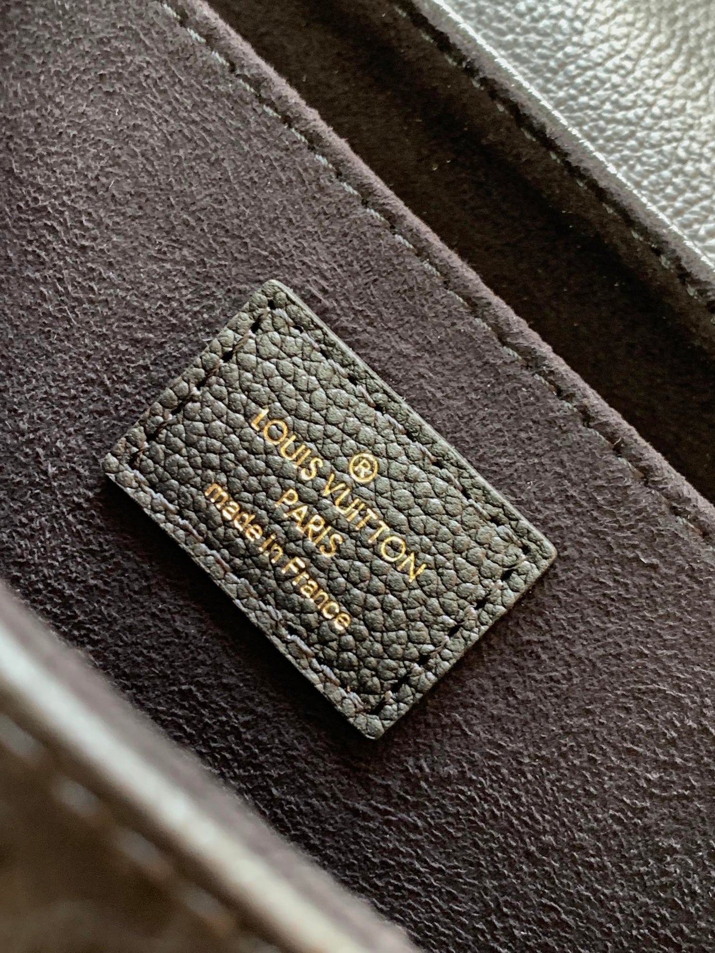 Louis Vuitton Elegant Black Embossed Leather Flap Bag with Gold Chain