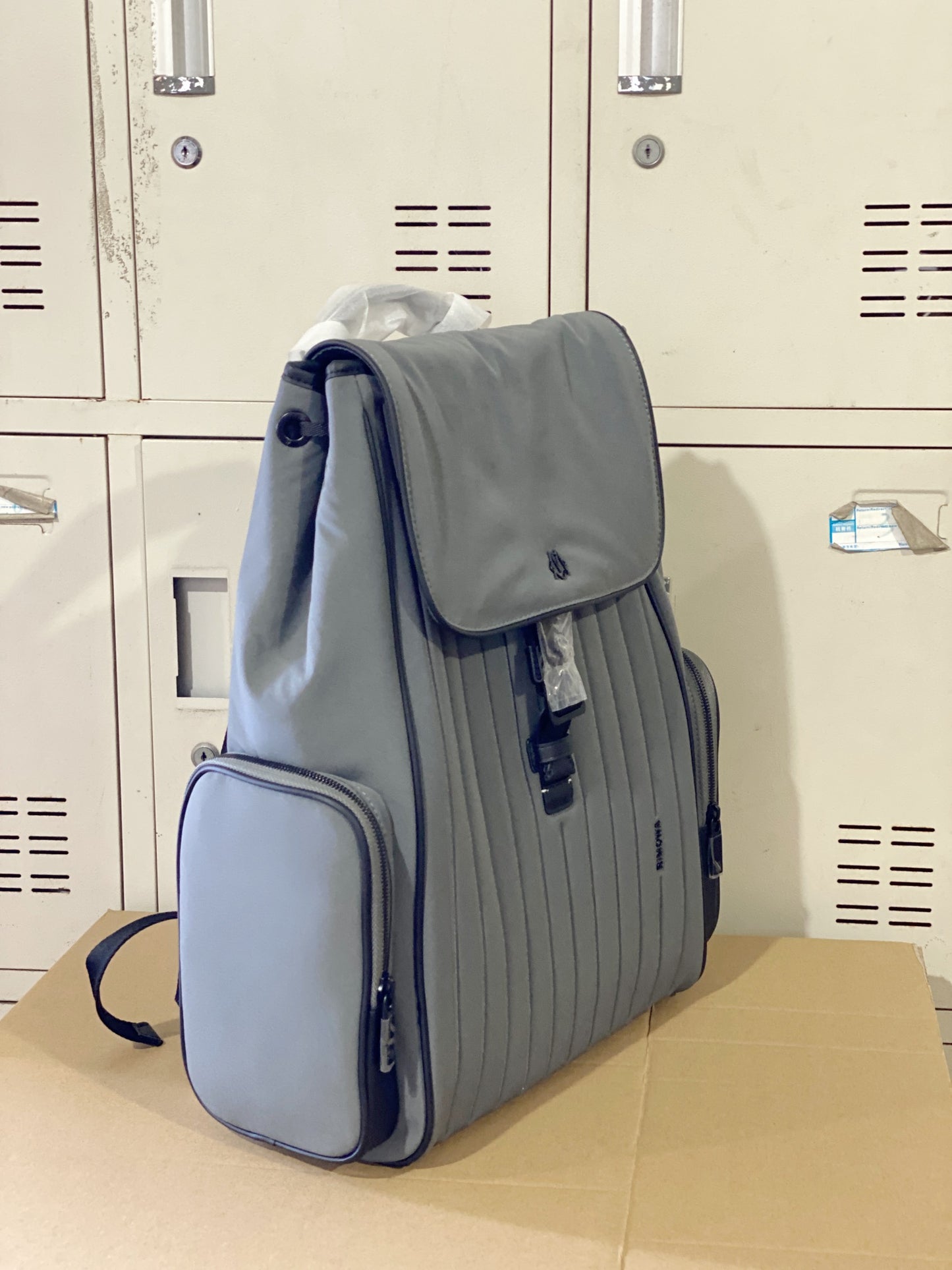 Grey Minimalist Flap Backpack with Ribbed Front Panel and Buckle