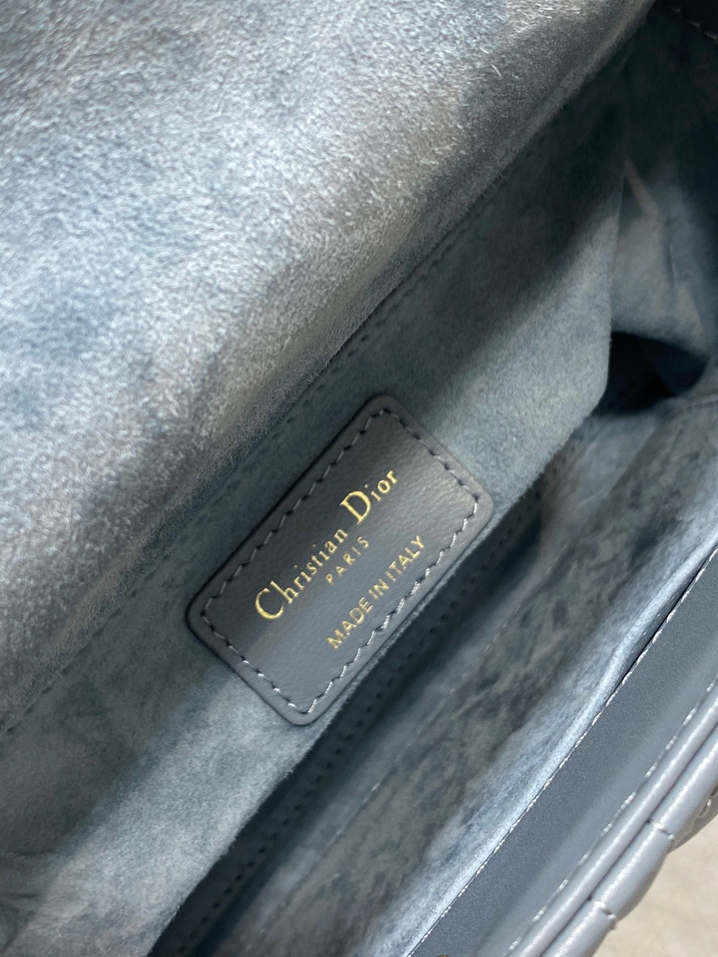 Dior Elegant Blue Quilted Leather Handbag with Top Handle and Strap