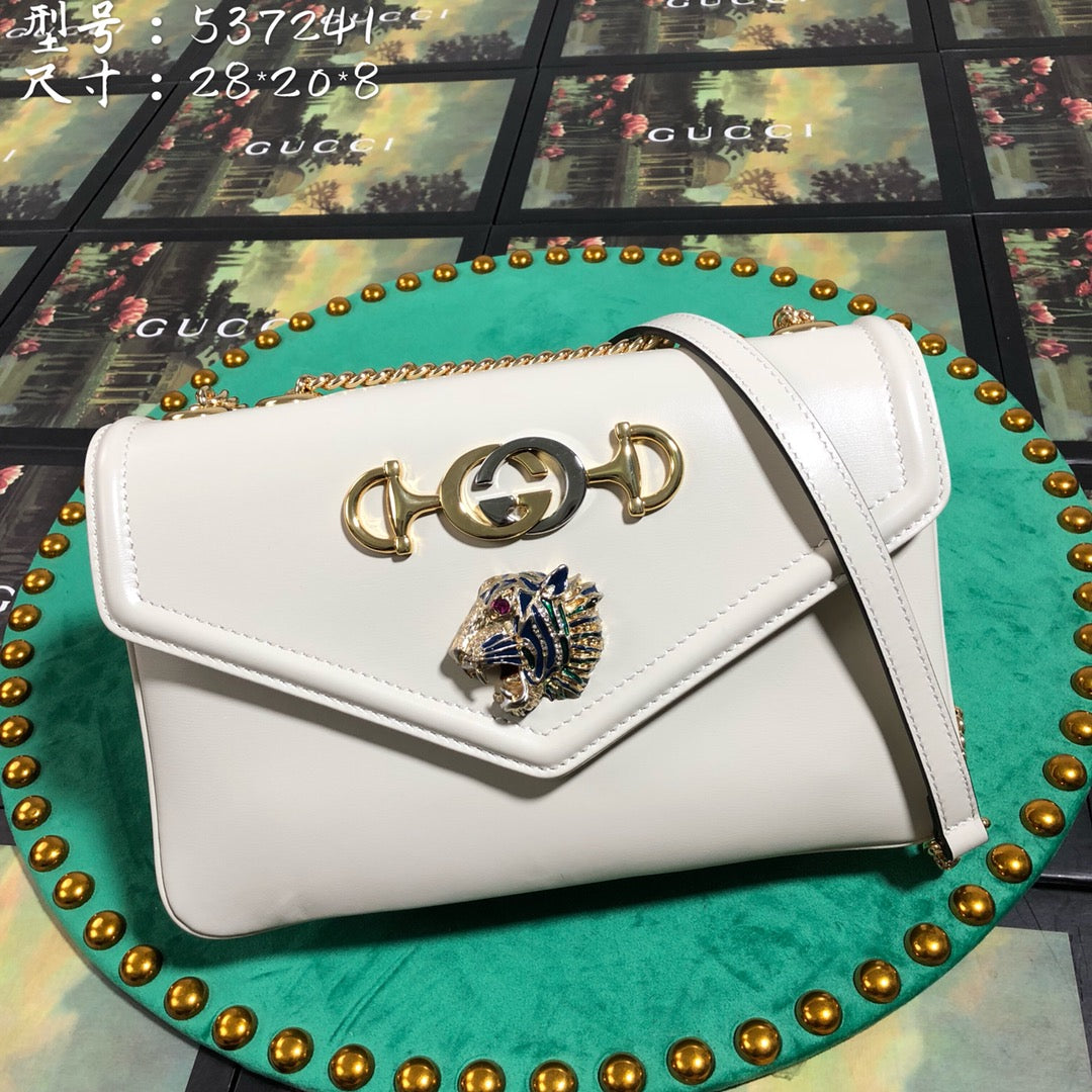 Gucci Elegant White Leather Envelope Shoulder Bag with Gold Tiger Head