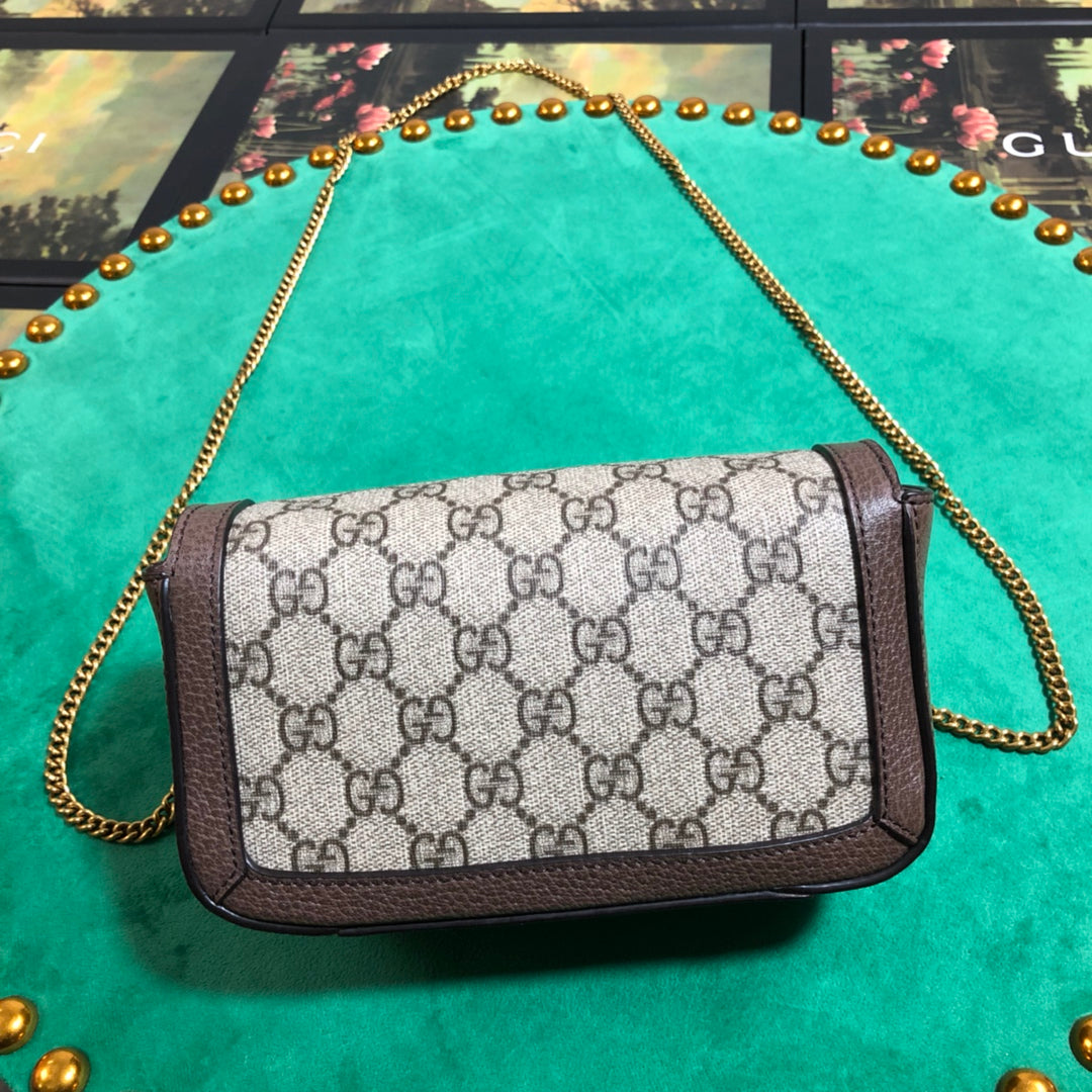 Gucci Vintage Style Monogram Shoulder Bag with Gold Hardware and Brown Trim
