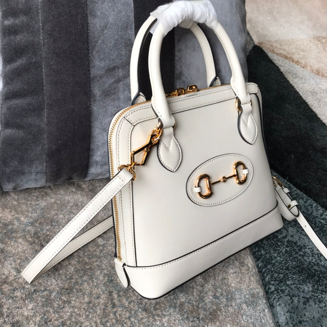 Gucci Elegant Off-White Leather Top Handle Bag with Horsebit Hardware