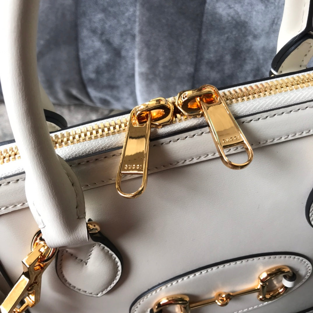 Gucci Elegant Off-White Leather Top Handle Bag with Horsebit Hardware