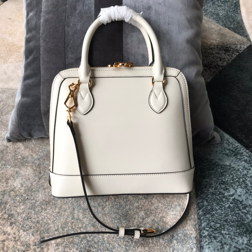 Gucci Elegant Off-White Leather Top Handle Bag with Horsebit Hardware