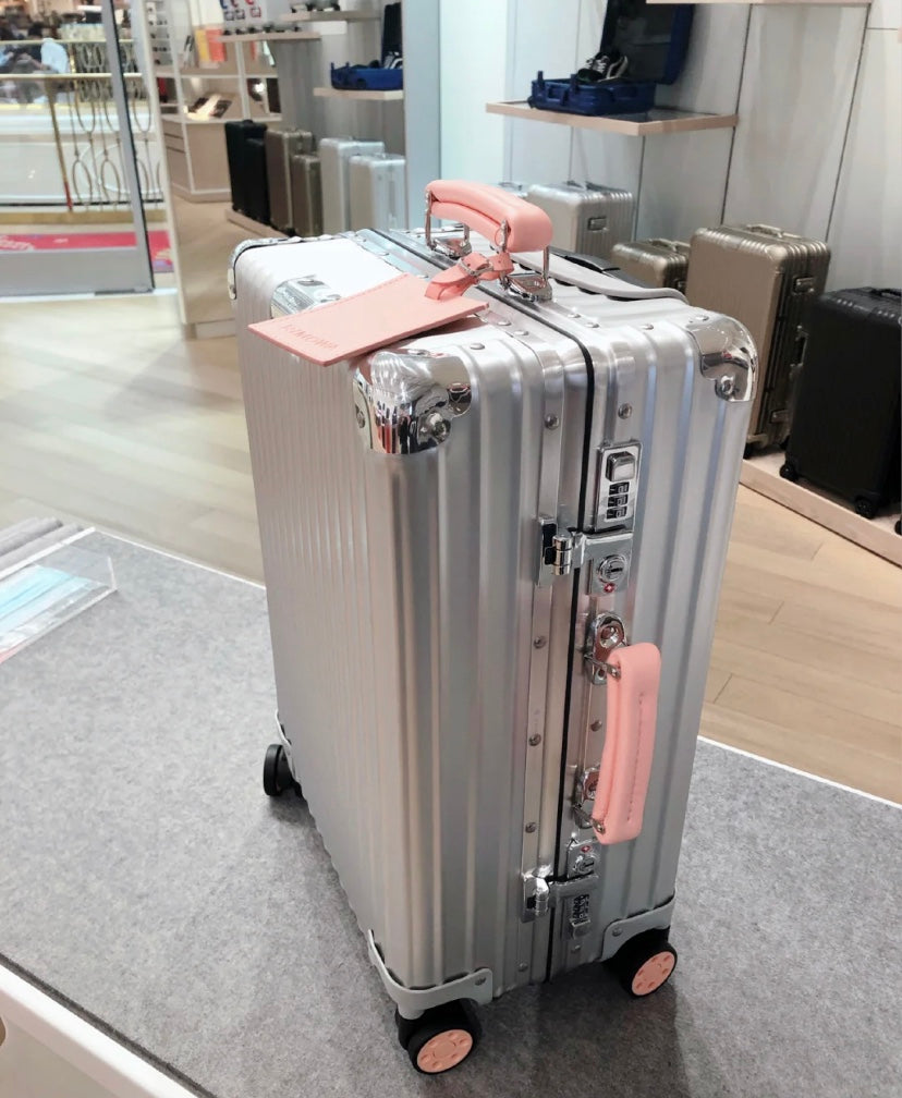 Silver Aluminum Style Spinner Suitcase with Pink Leather Handles