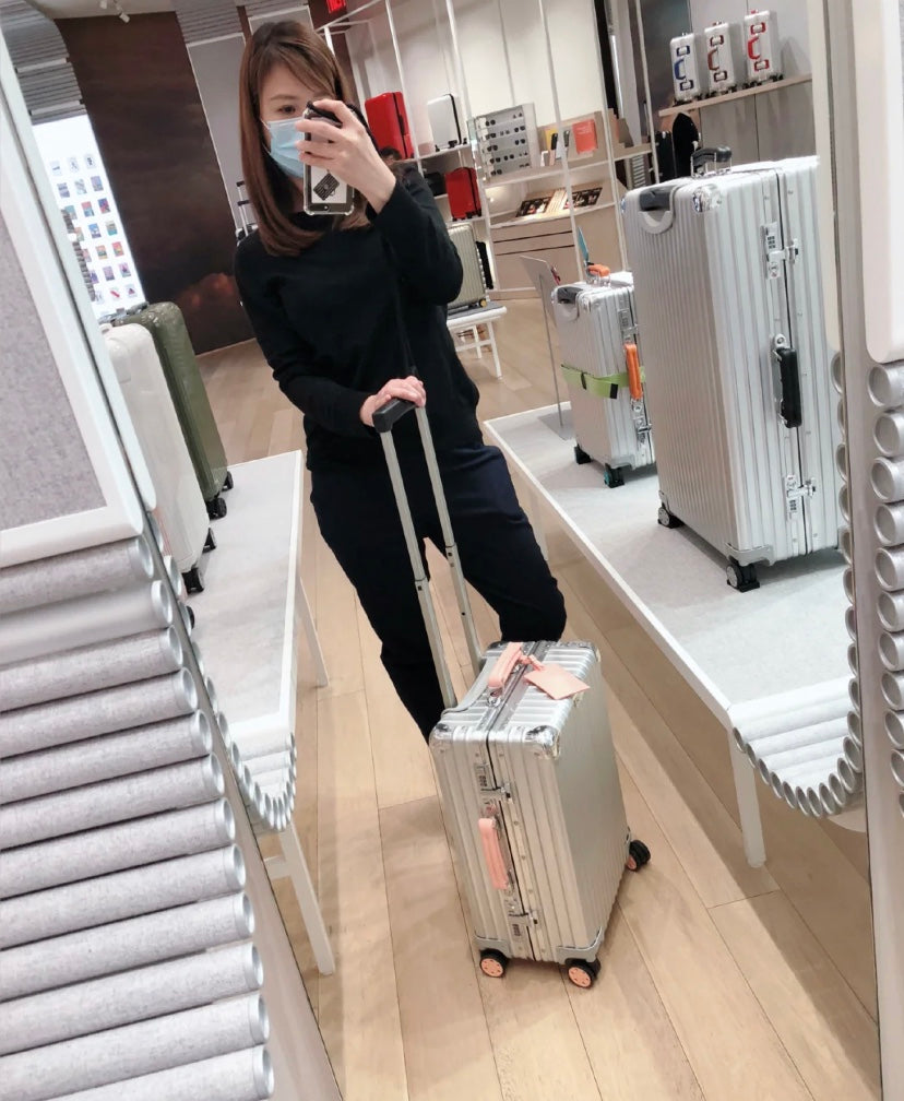 Silver Aluminum Style Spinner Suitcase with Pink Leather Handles
