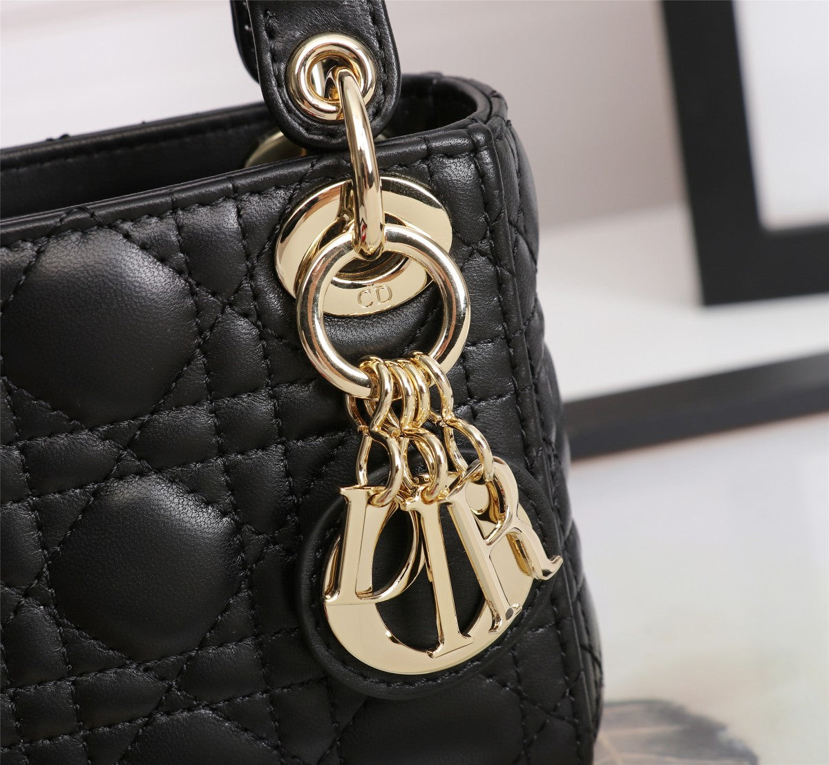 Dior Mini Black Quilted Leather Crossbody Handbag with Gold Charms