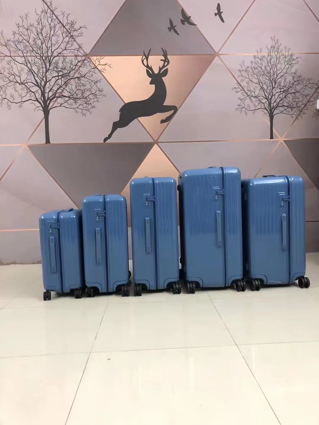 5-Piece Blue Hardside Spinner Luggage Set with Ribbed Design