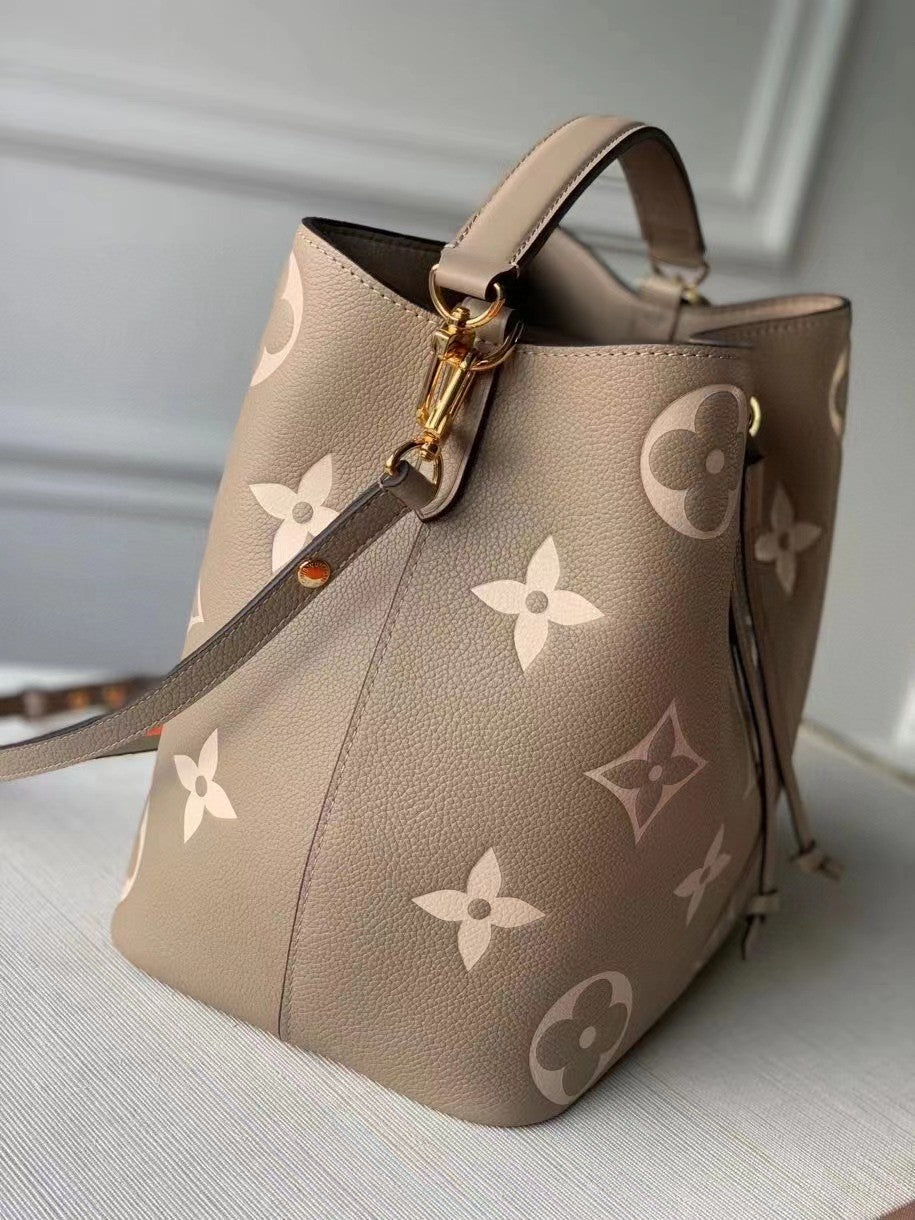 Louis Vuitton Elegant Taupe Monogram Leather Bucket Bag and Matching Pouch Set
