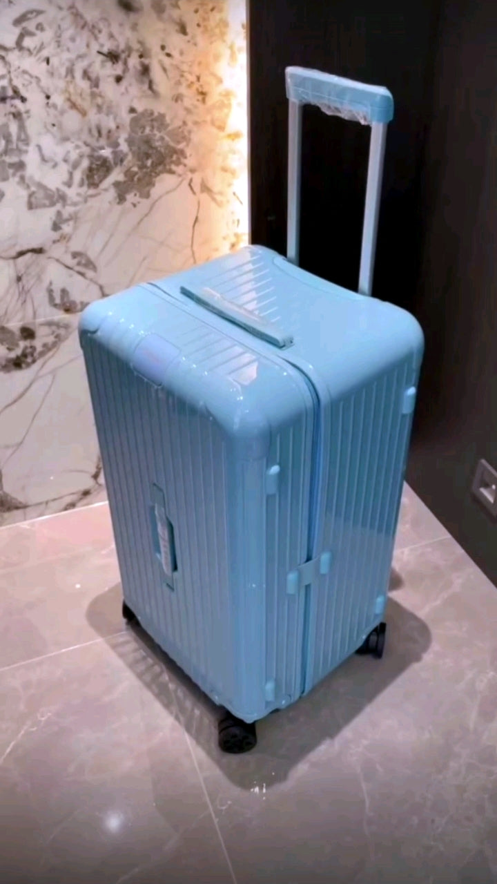 Light Blue Ribbed Hardside Spinner Suitcase for Travel