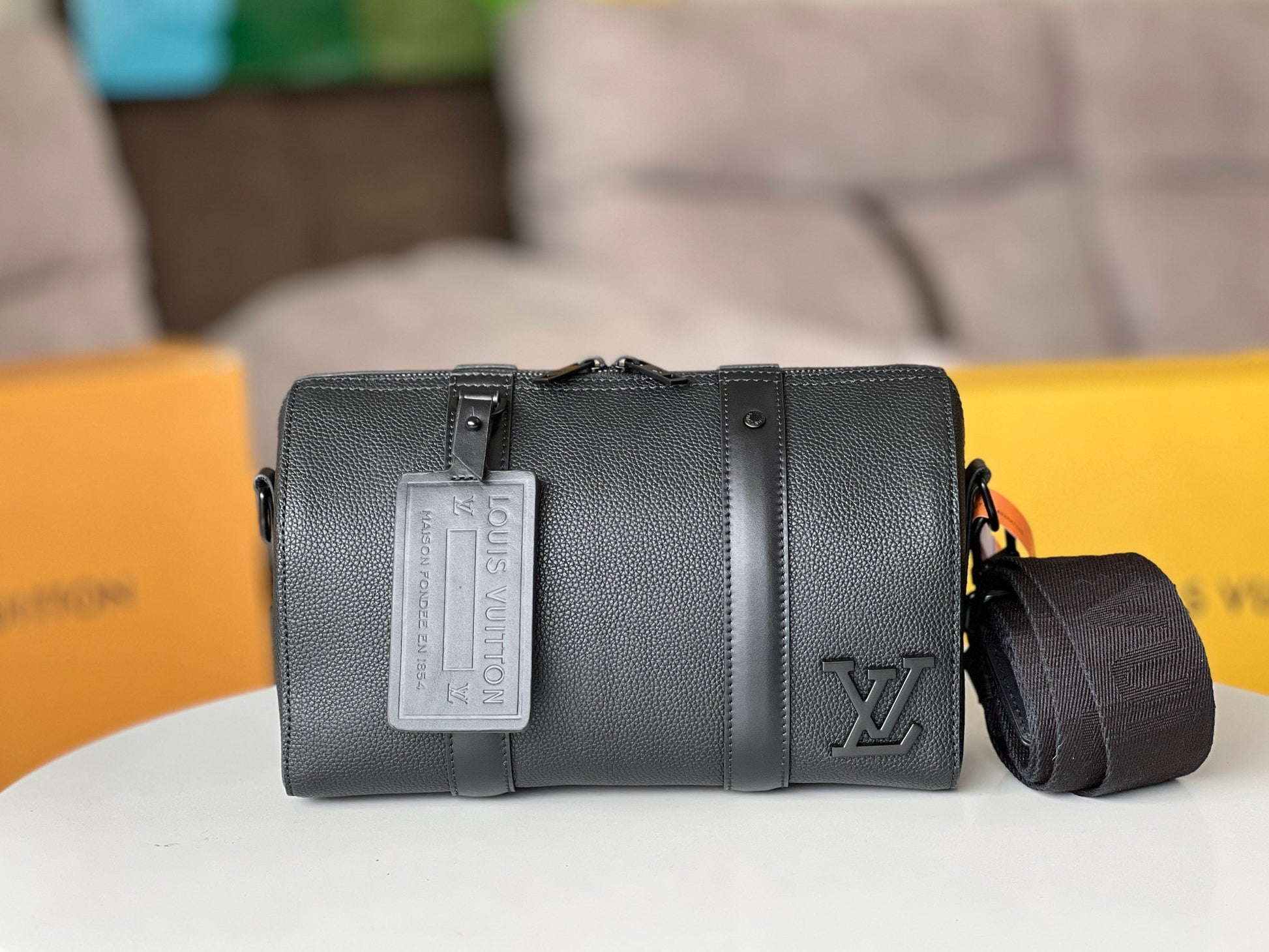 Louis Vuitton Minimalist Black Barrel Crossbody Shoulder Bag with Luggage Tag
