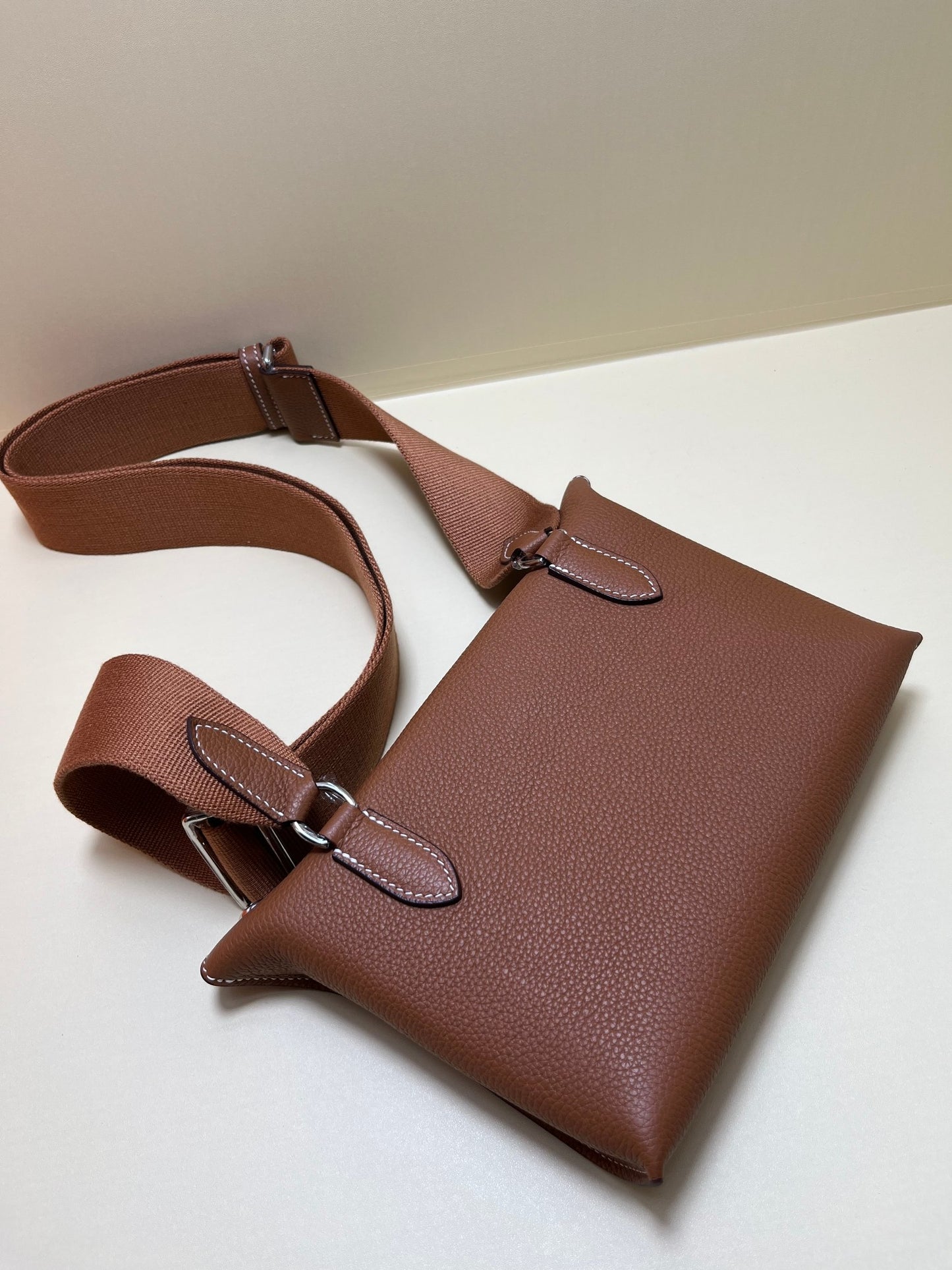 Small Brown Perforated Leather Crossbody Bag with Shoulder Strap