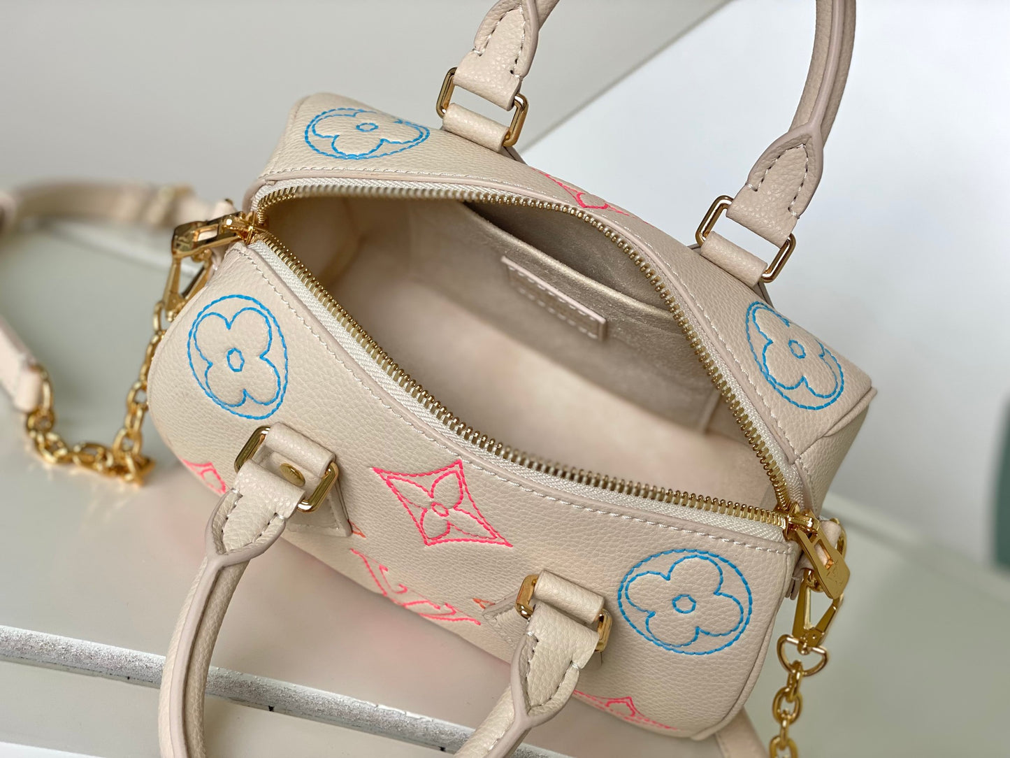 Louis Vuitton Elegant Pastel Pink Leather Monogram Handbag with Chain Strap