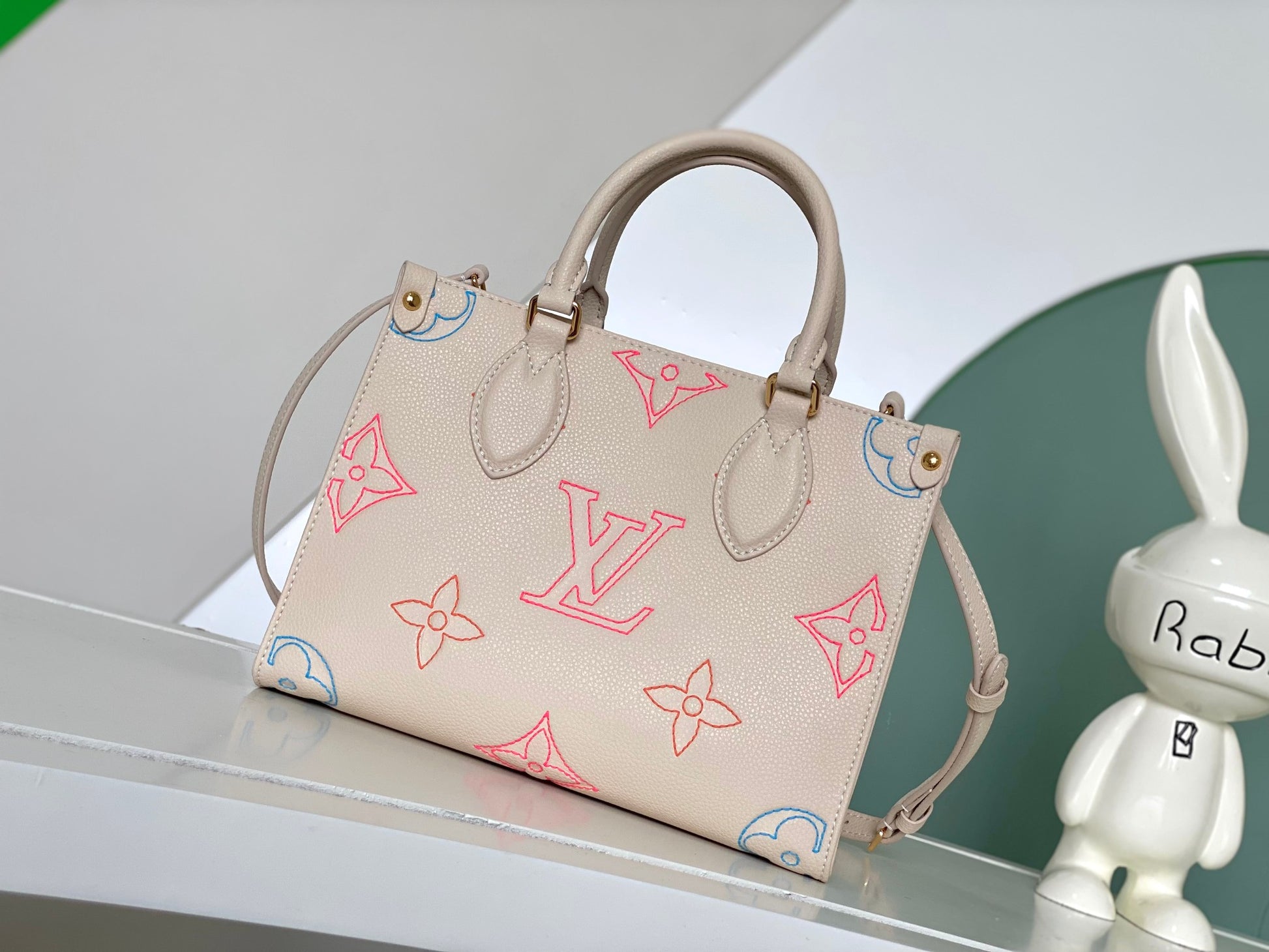 Louis Vuitton Luxury Pastel Pink Leather Tote Bag with Embossed Floral Pattern