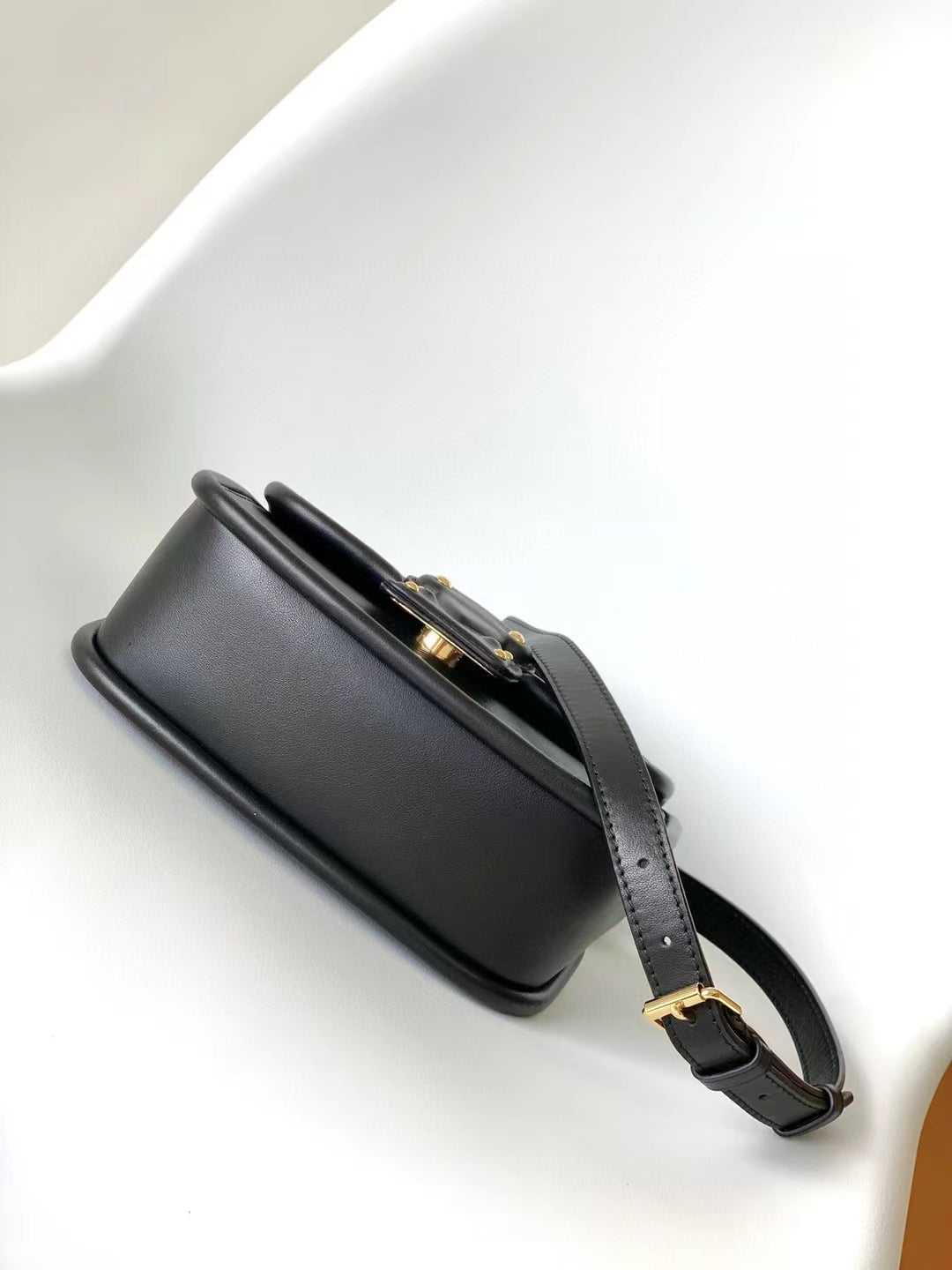 Elegant Black Leather Mini Top-Handle Handbag with Gold-Tone Hardware