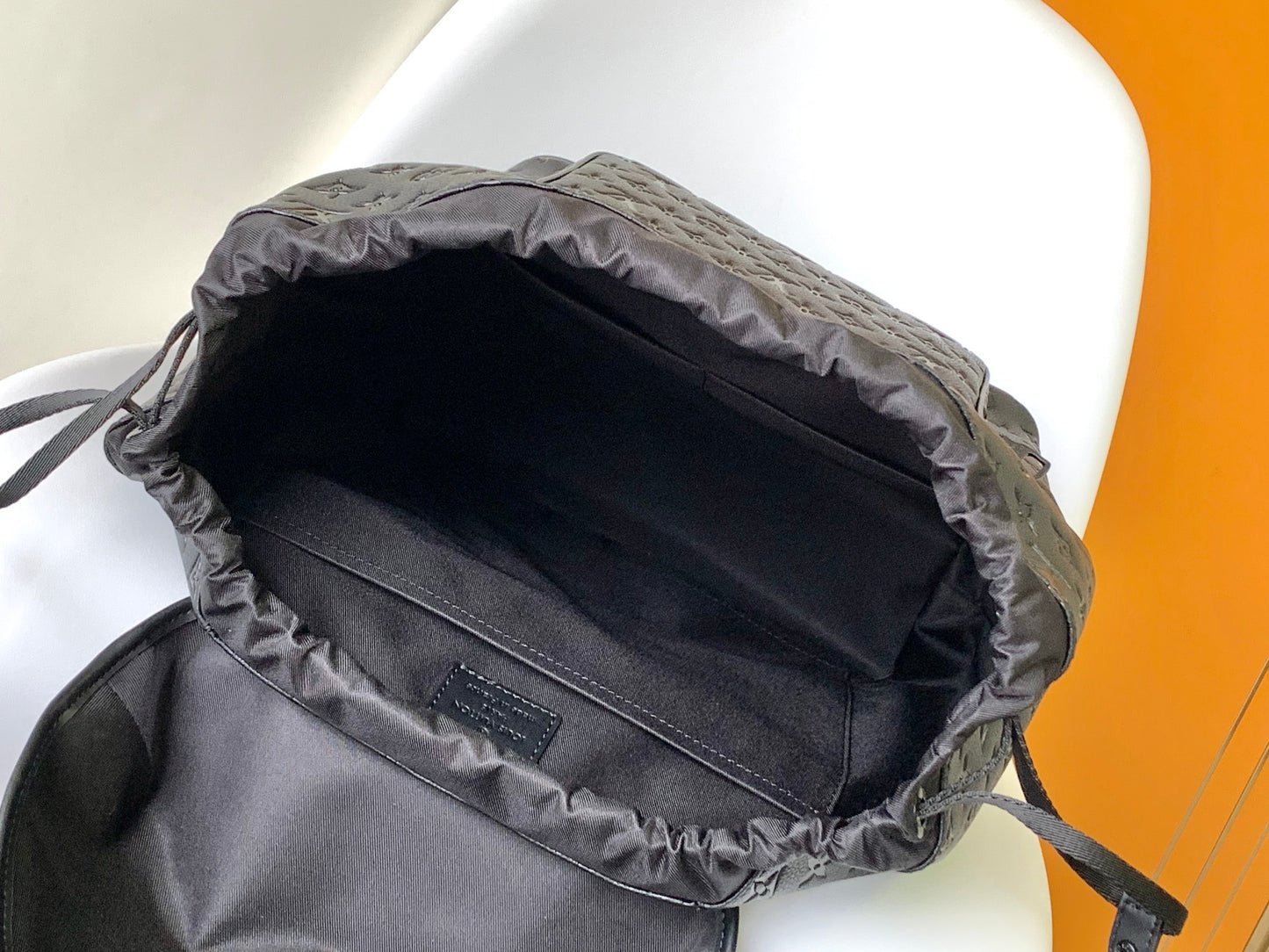 Louis Vuitton Matte Black Embossed Monogram Leather Backpack with Buckle Flap