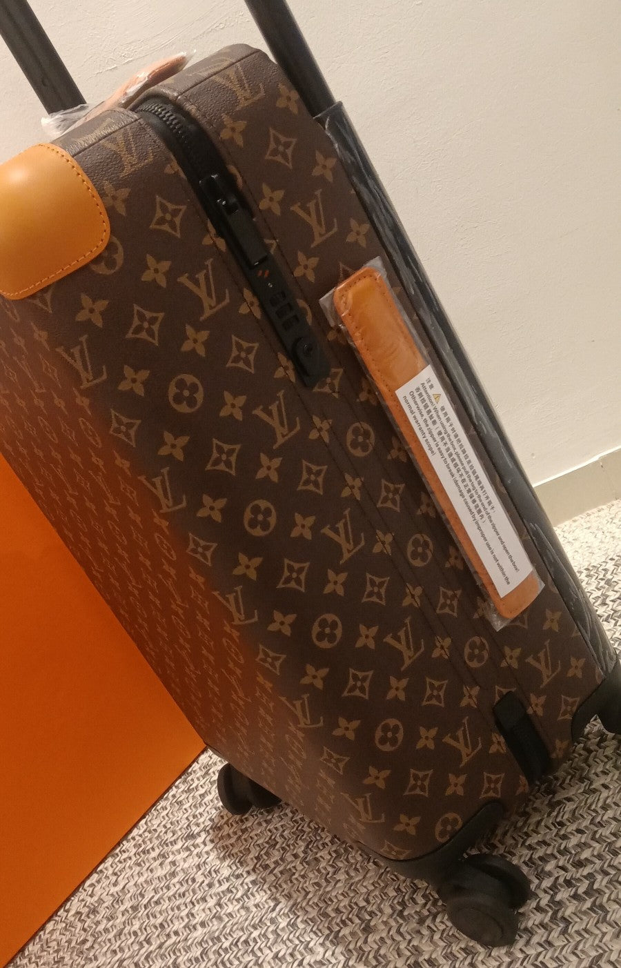 Brown Monogram Pattern Spinner Suitcase with Orange Leather Trim