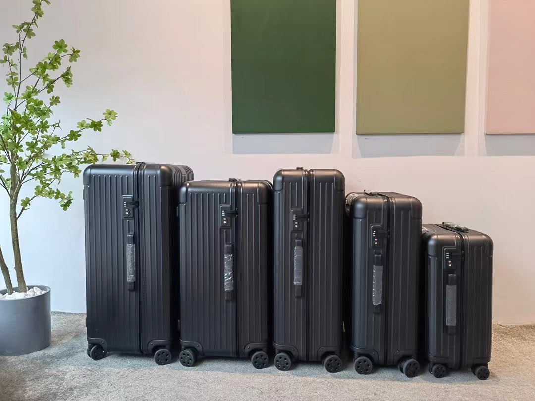 Sleek Matte Black Ribbed Hardshell Spinner Suitcase Set