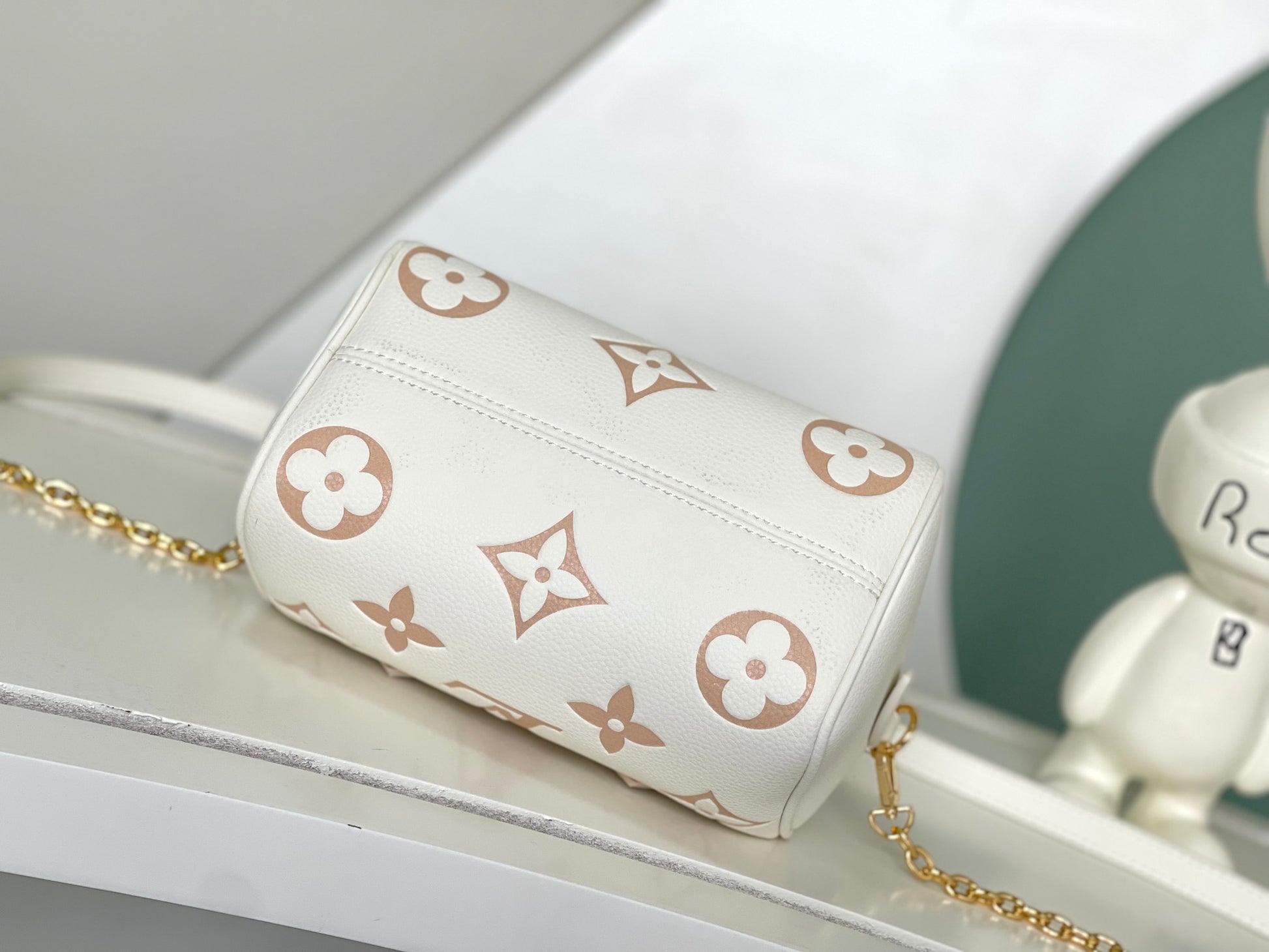 Louis Vuitton Elegant Beige Embossed Leather Mini Crossbody Bag with Top Handle