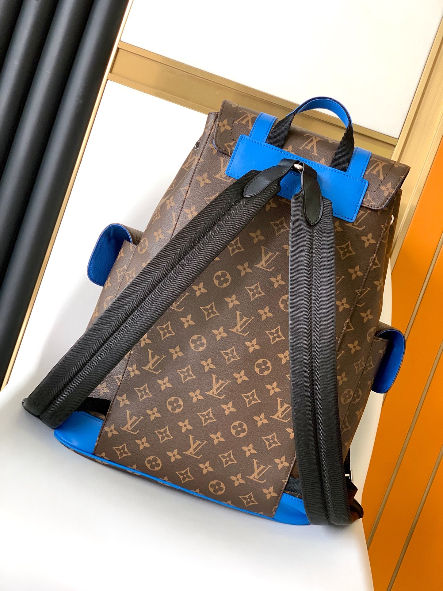 Louis Vuitton Luxury Monogram Canvas Backpack with Bright Blue Leather Straps