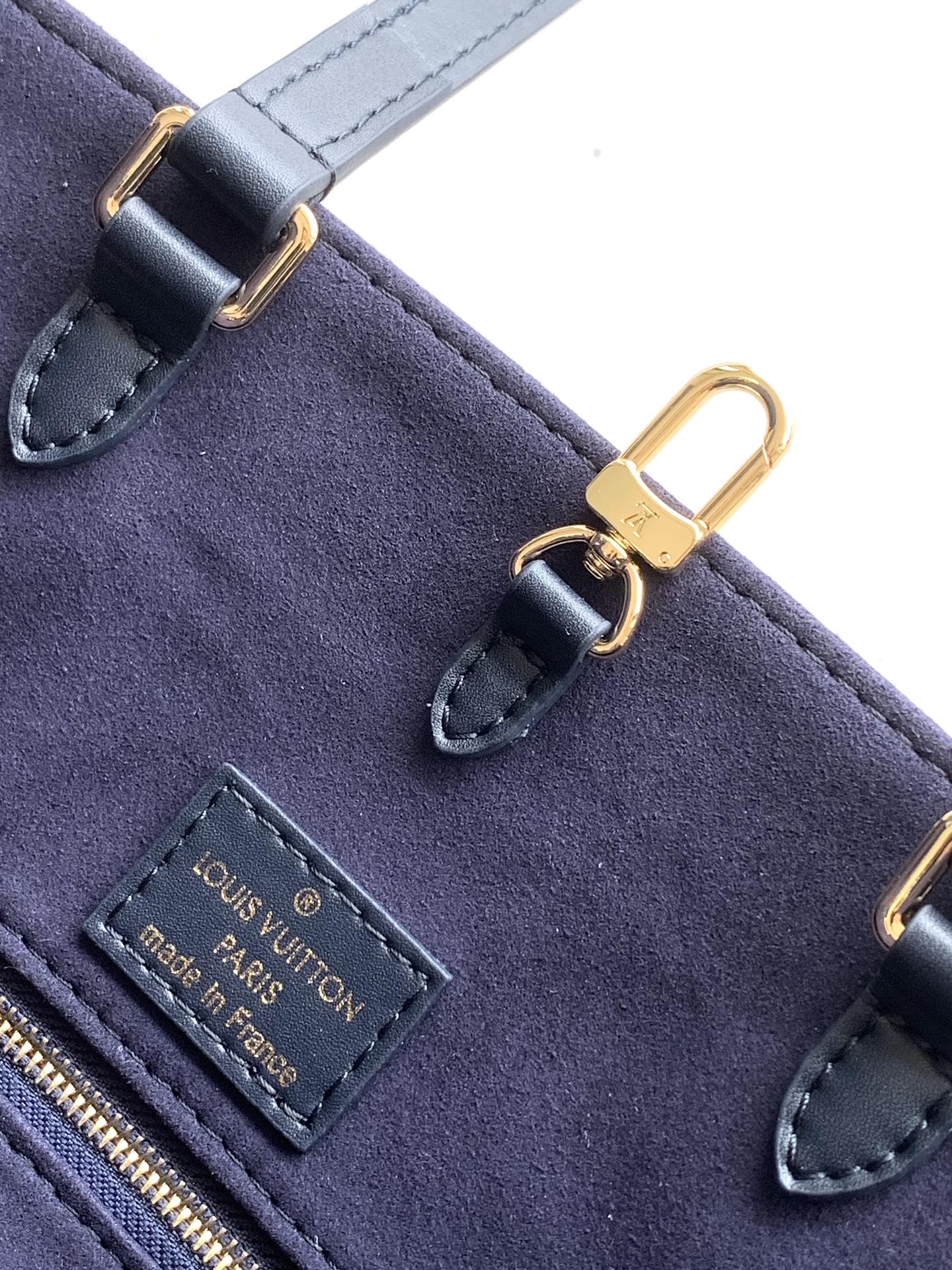 Louis Vuitton Elegant Navy Blue Leather Tote Bag with Floral Monogram Pattern