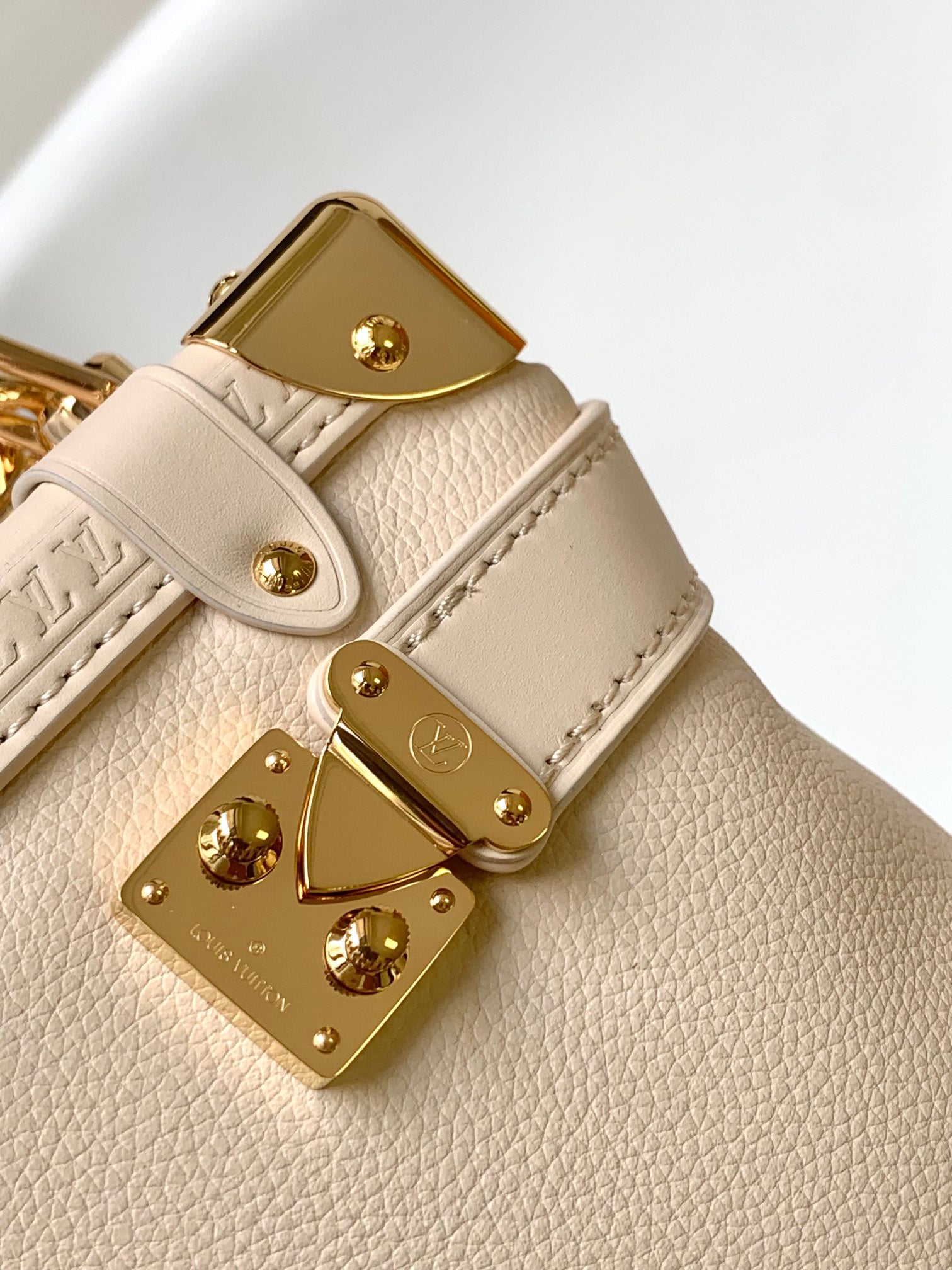 Louis Vuitton Elegant Cream Leather Trunk Shoulder Bag with Gold Hardware