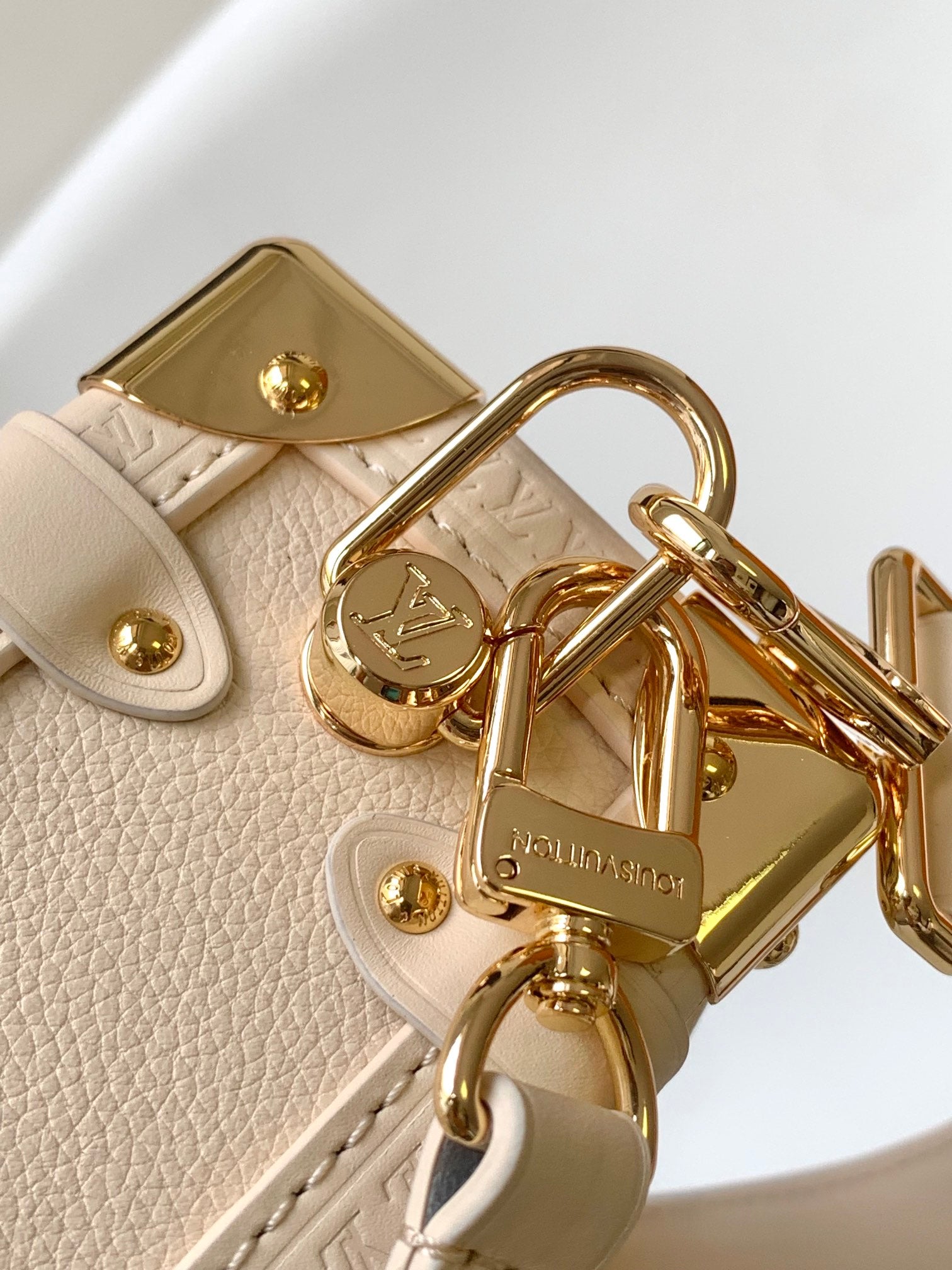 Louis Vuitton Elegant Cream Leather Trunk Shoulder Bag with Gold Hardware