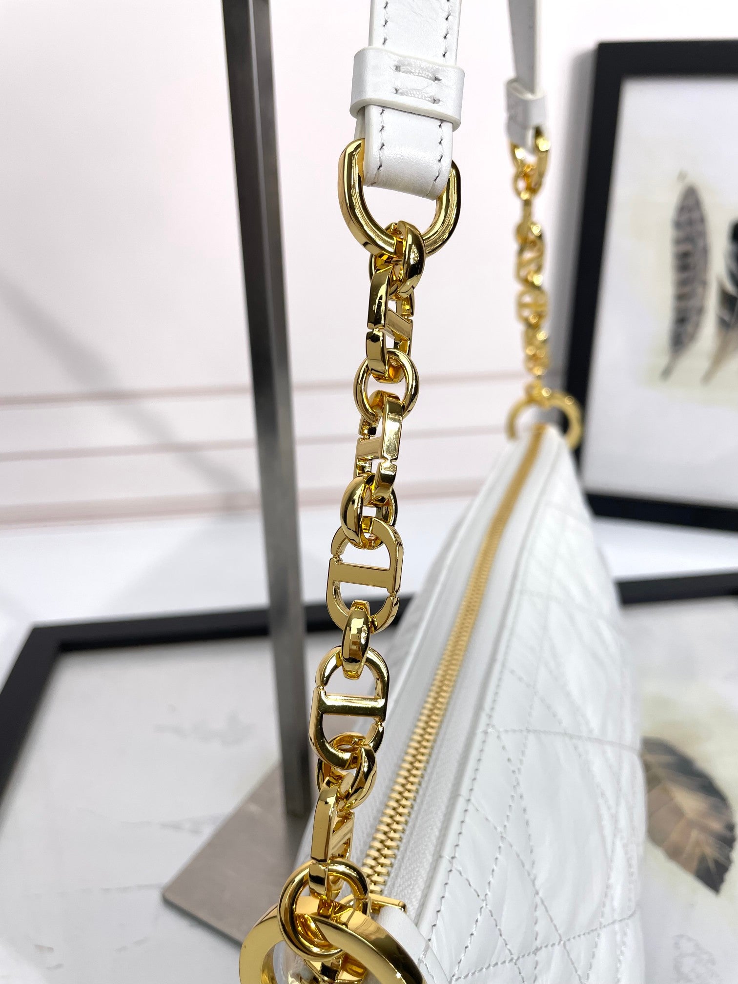 Dior Elegant White Quilted Hobo Handbag with Gold Chain Strap