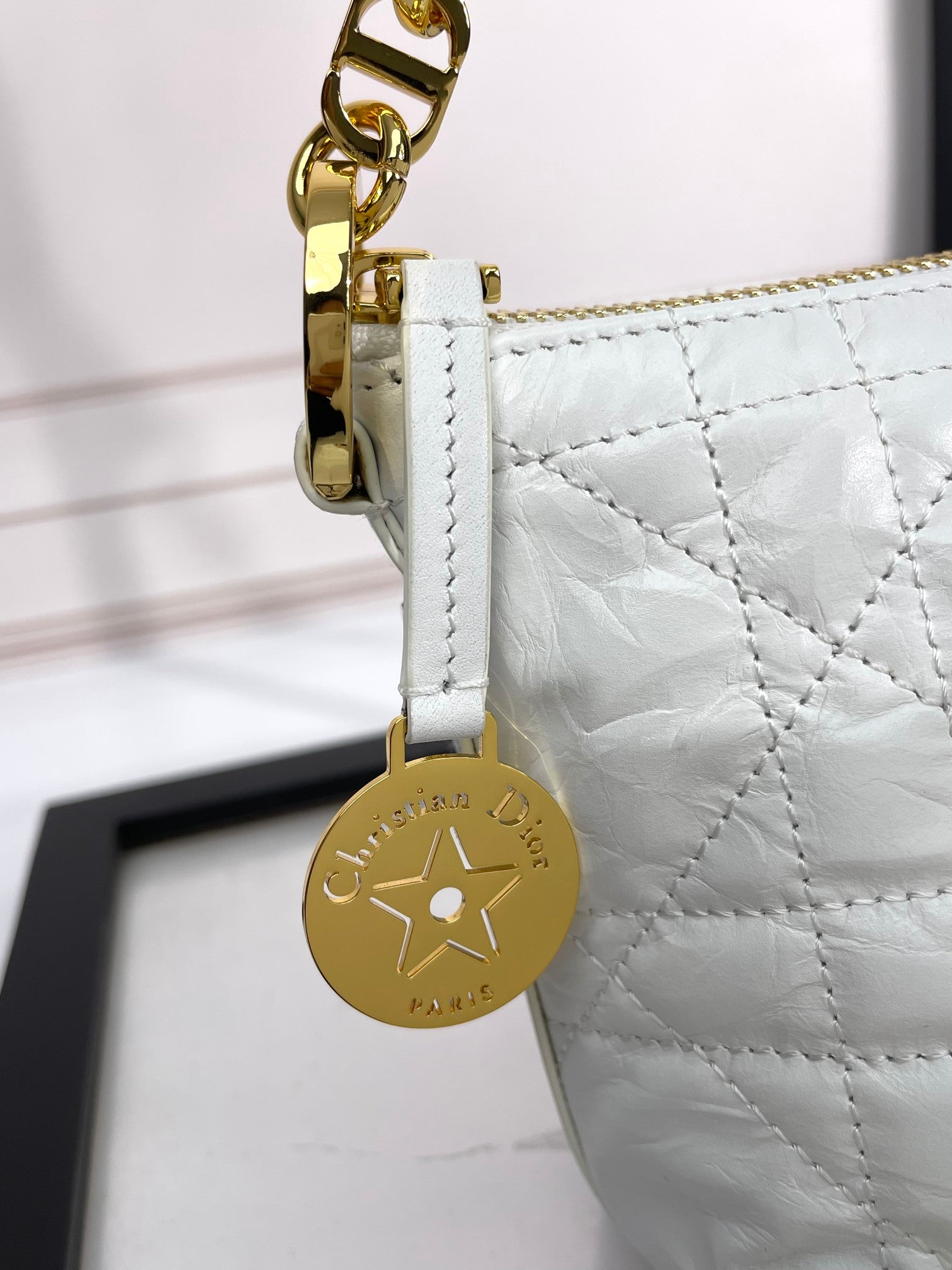 Dior Elegant White Quilted Hobo Handbag with Gold Chain Strap