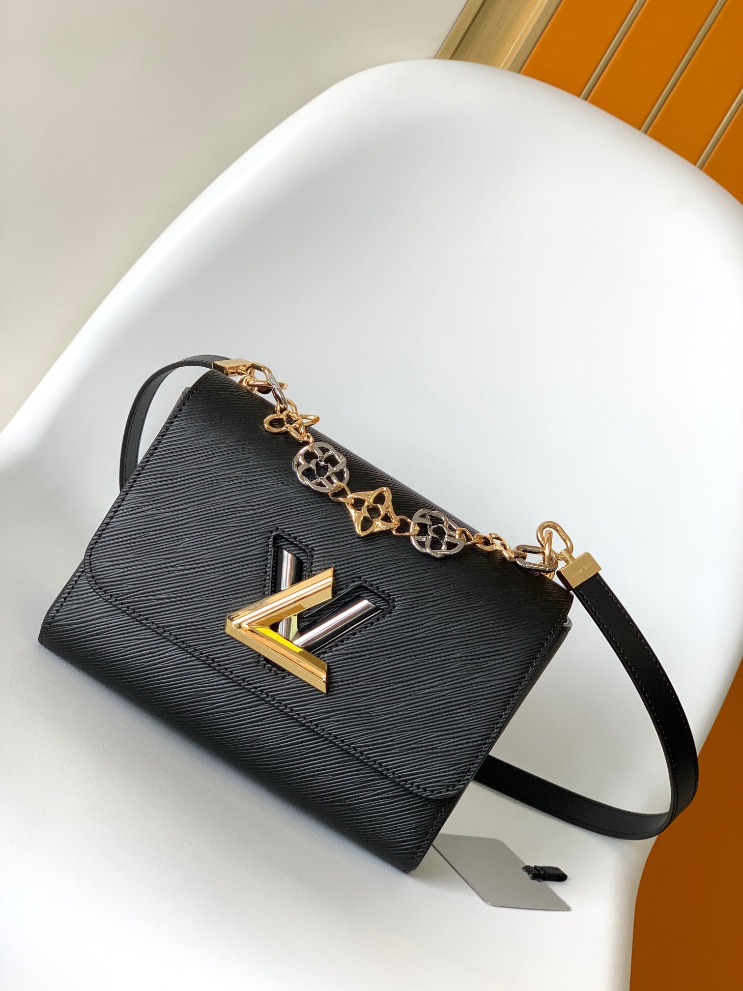 Louis Vuitton Luxury Black Leather Shoulder Bag with Two-Tone Metallic Clasp
