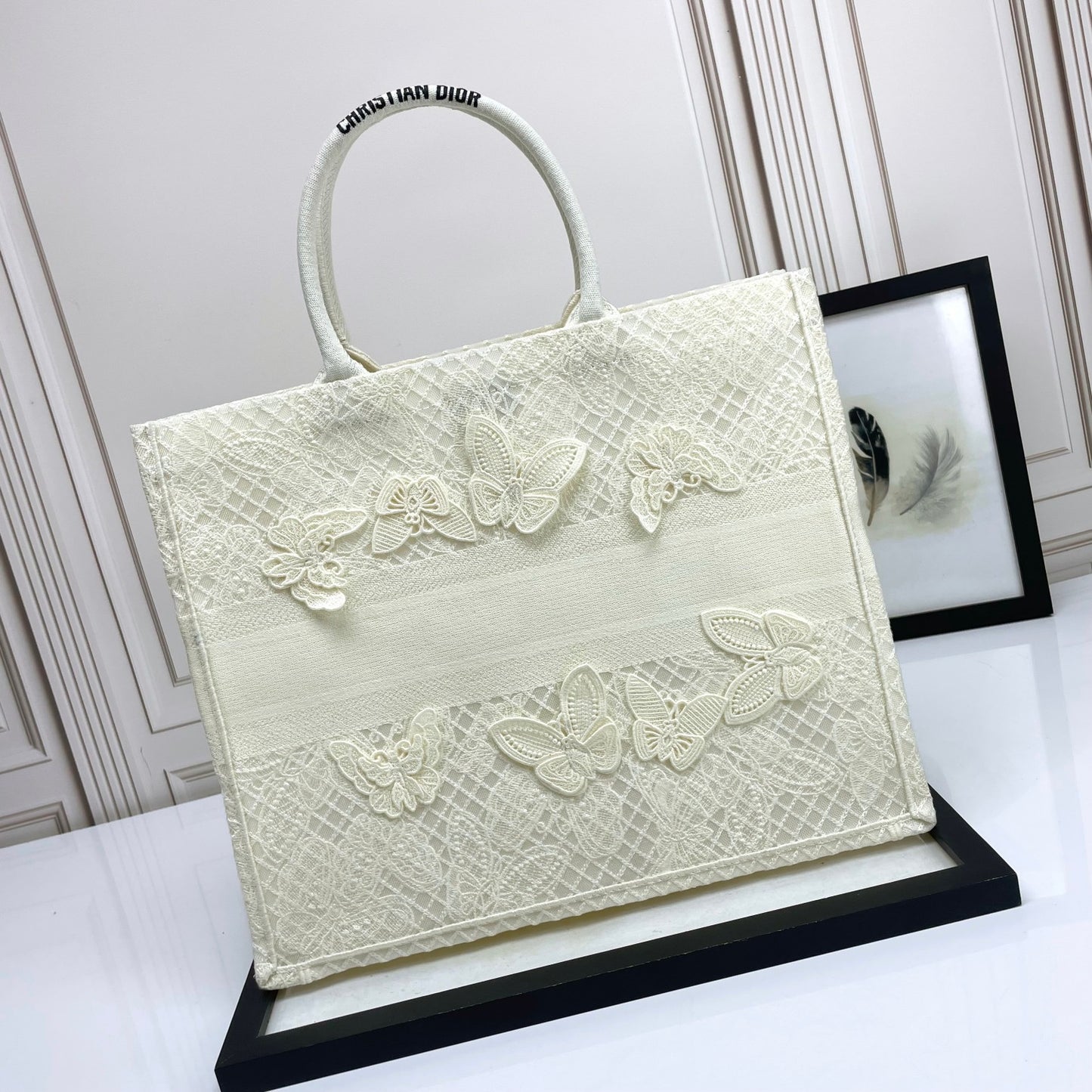 Dior Elegant Cream Canvas Handbag with 3D Textured Butterfly Appliqué