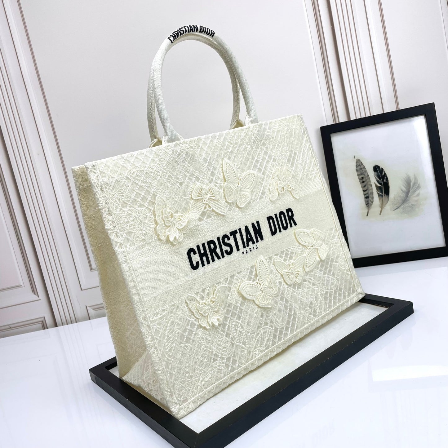 Dior Elegant Cream Canvas Handbag with 3D Textured Butterfly Appliqué