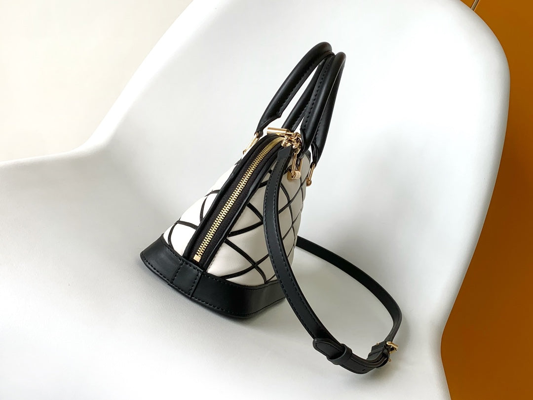 Louis Vuitton Elegant Black and White Diamond Lattice Dome Satchel Bag