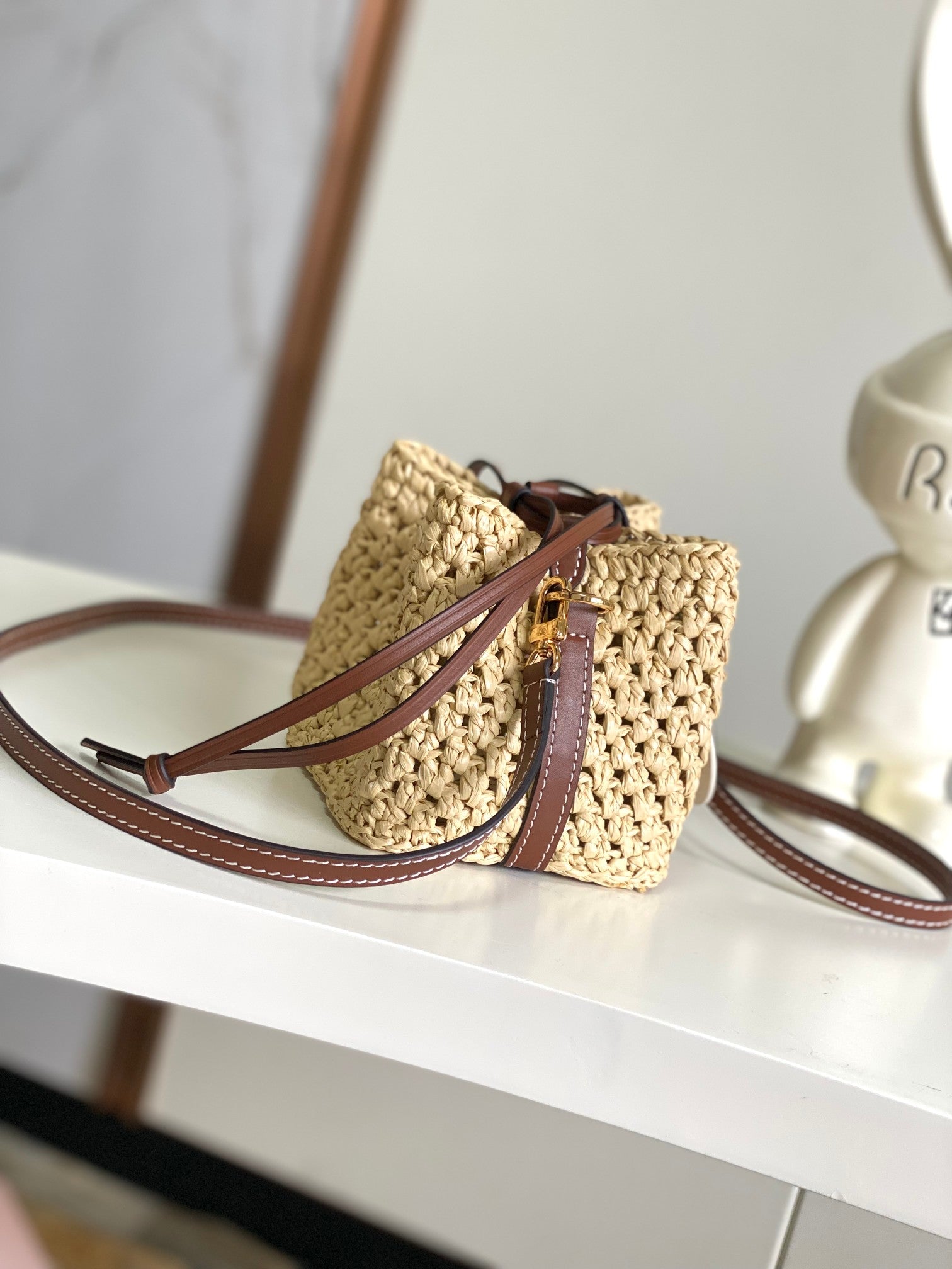 Louis Vuitton Woven Straw Crossbody Bucket Bag with Brown Leather Details