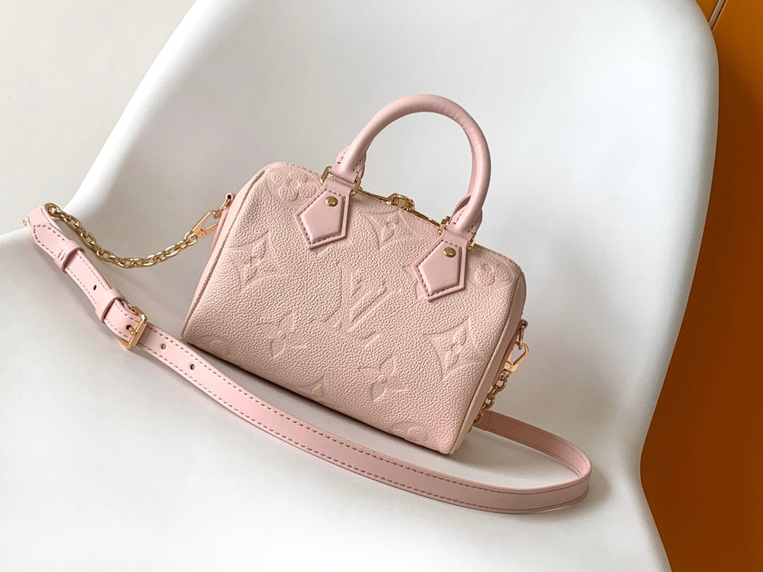 Louis Vuitton Elegant Pastel Pink Embossed Leather Top Handle Satchel Bag
