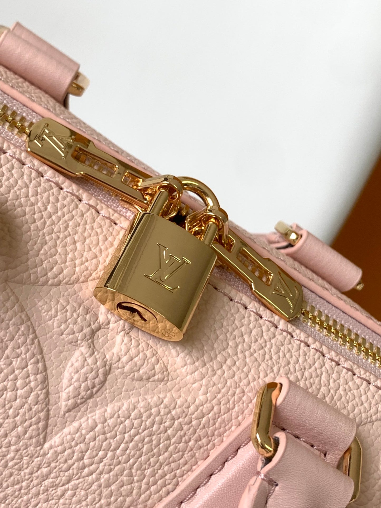 Louis Vuitton Elegant Pastel Pink Embossed Leather Top Handle Satchel Bag