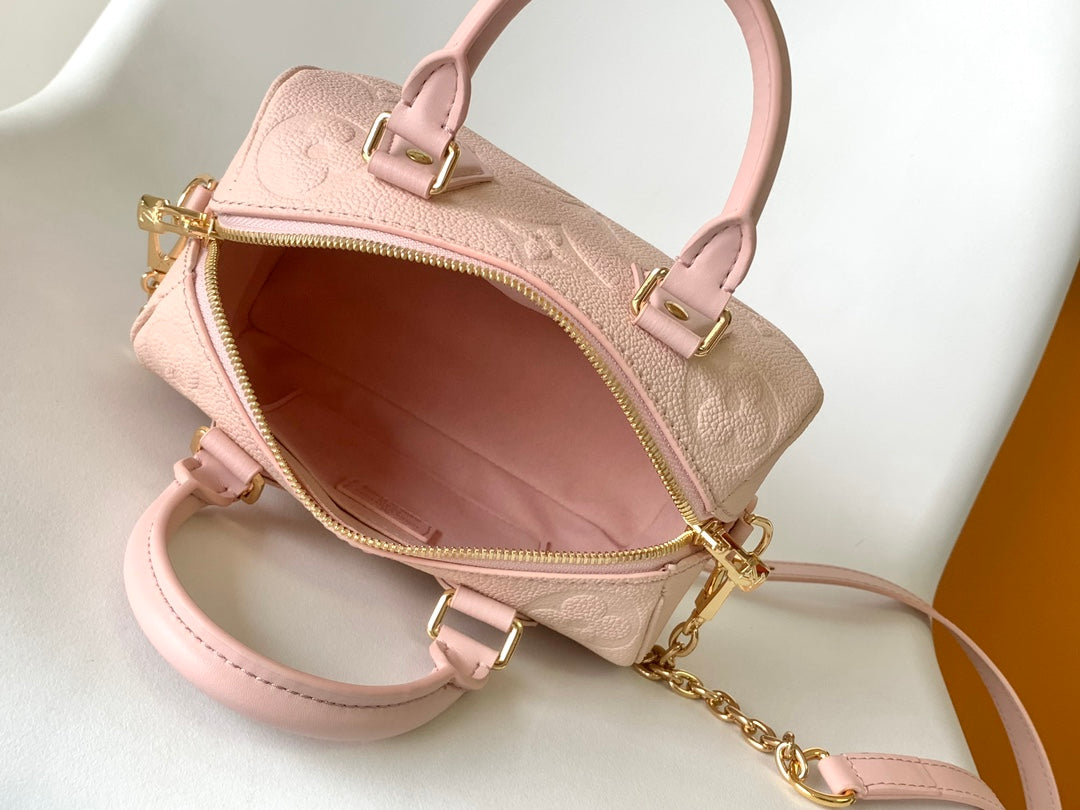Louis Vuitton Elegant Pastel Pink Embossed Leather Top Handle Satchel Bag