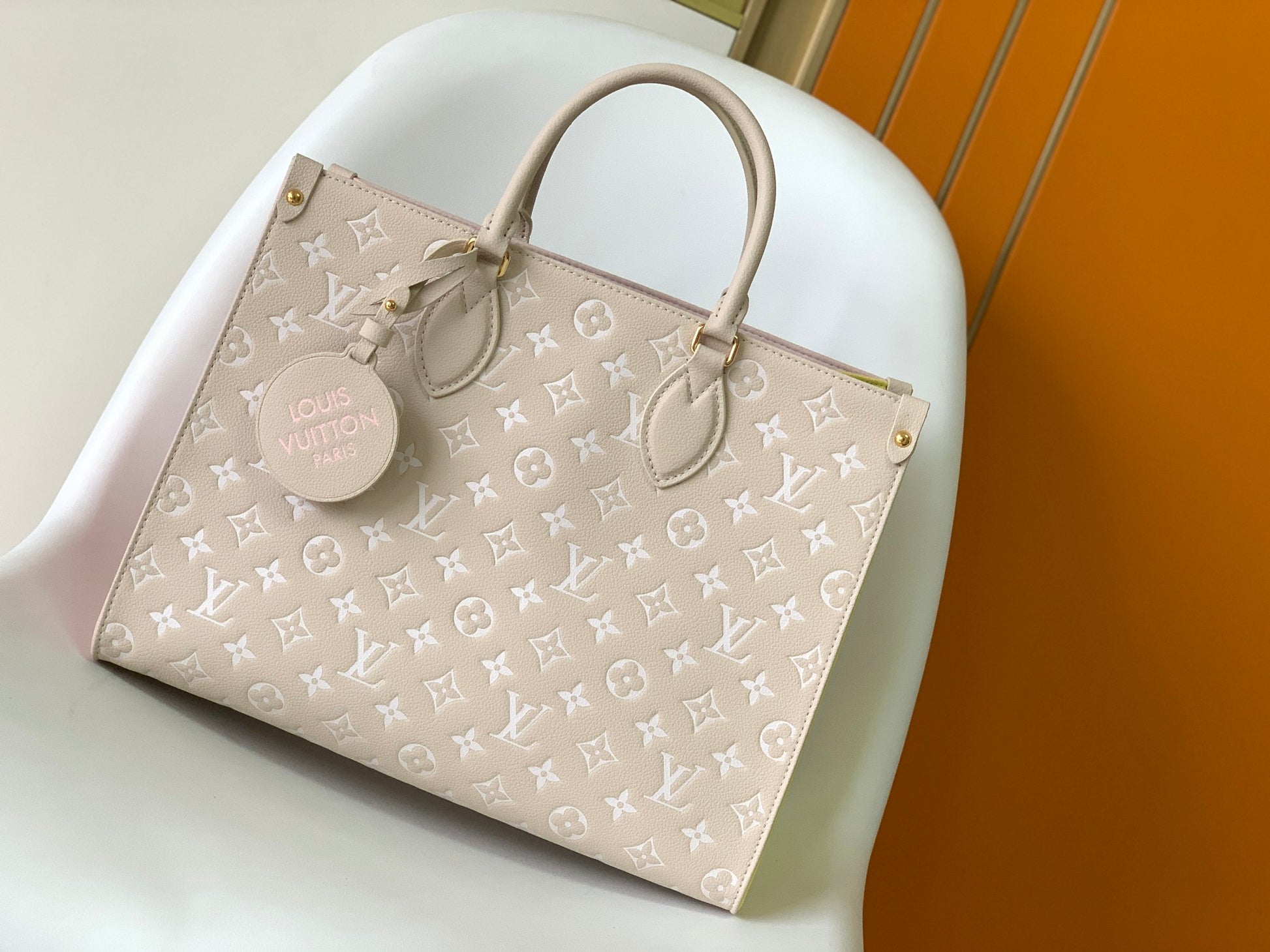 Louis Vuitton Pastel Pink Embossed Monogram Leather Tote Bag with Top Handles