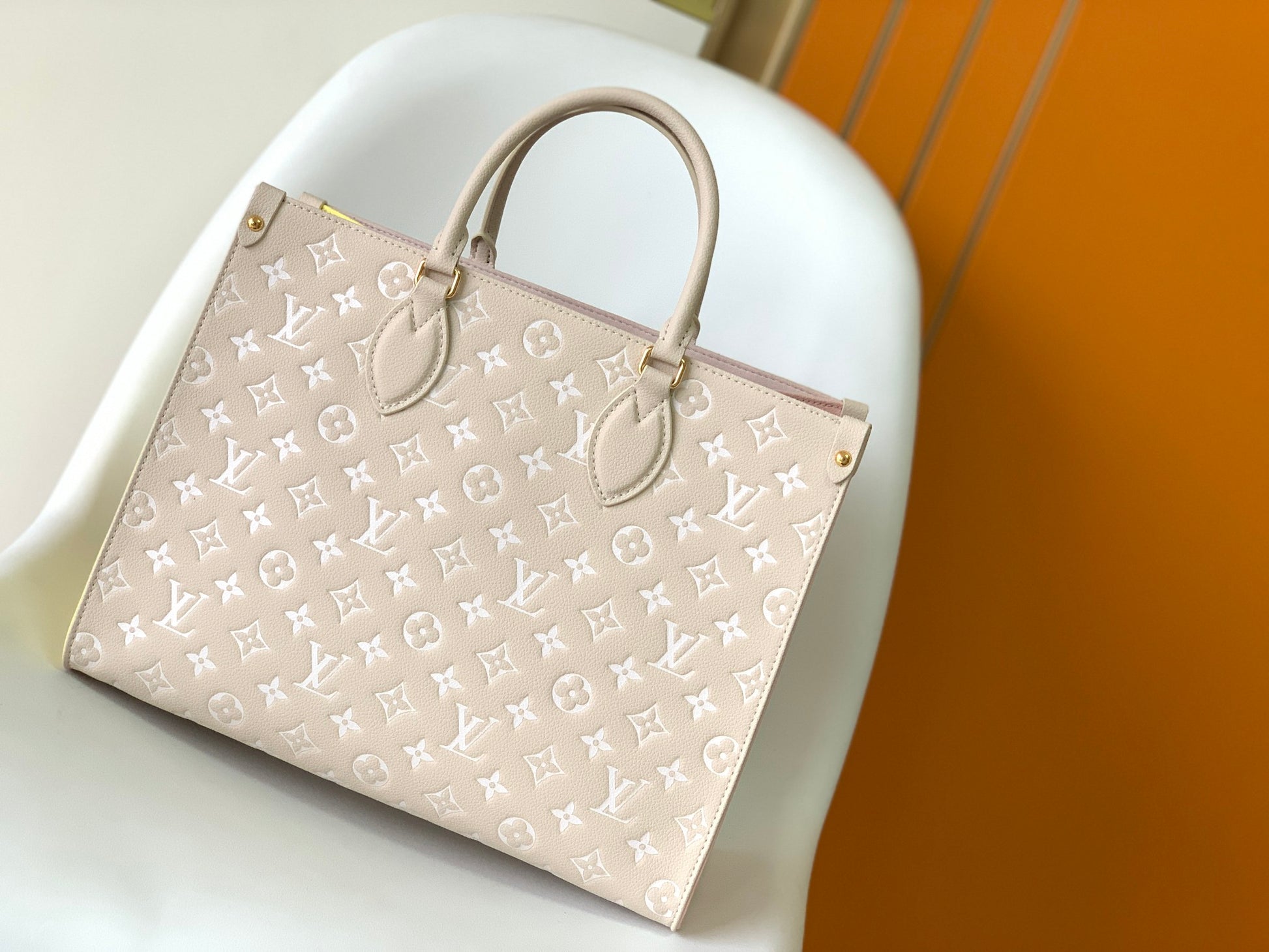 Louis Vuitton Pastel Pink Embossed Monogram Leather Tote Bag with Top Handles
