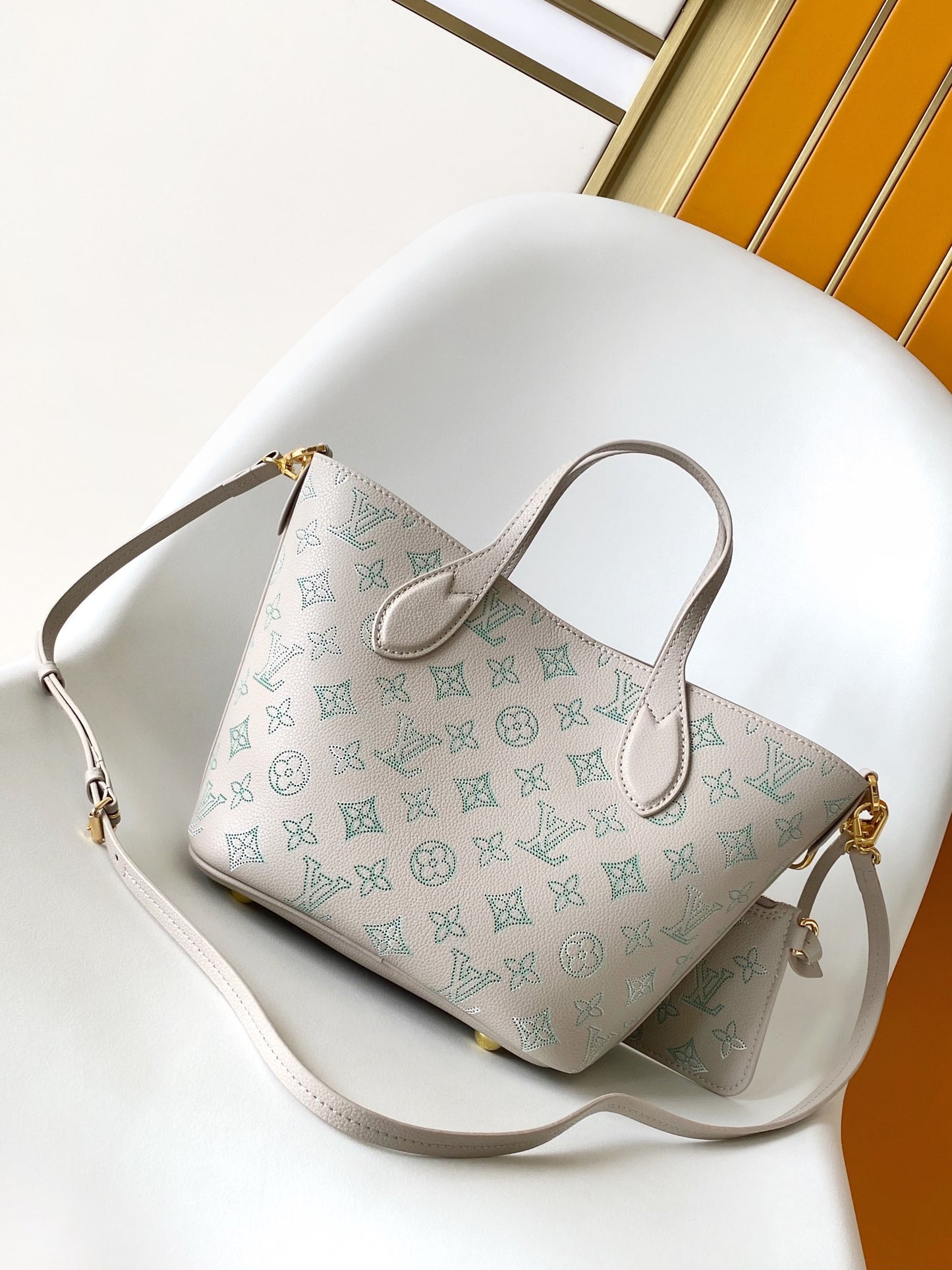 Louis Vuitton Elegant Light Pink Monogram Leather Tote Bag with Charm