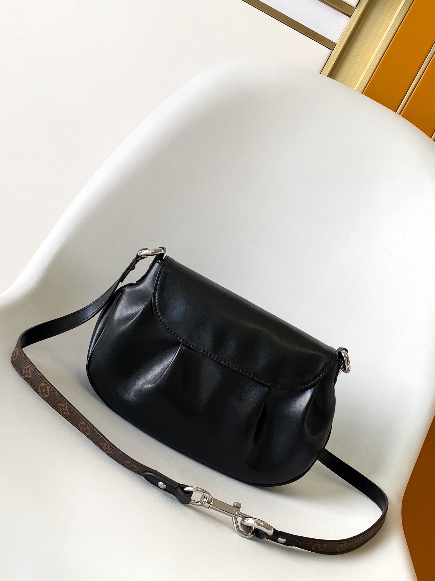 Louis Vuitton Classic Black Leather Shoulder Bag with Flap and Metallic Clasp