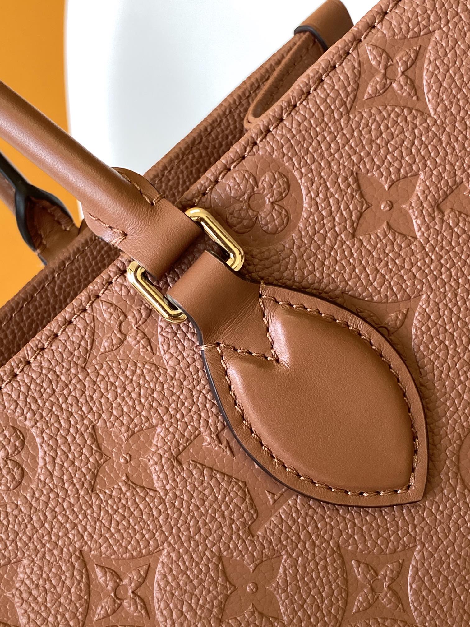 Louis Vuitton OnTheGo MM Monogram Empreinte Leather Tote Bag - Cognac Brown