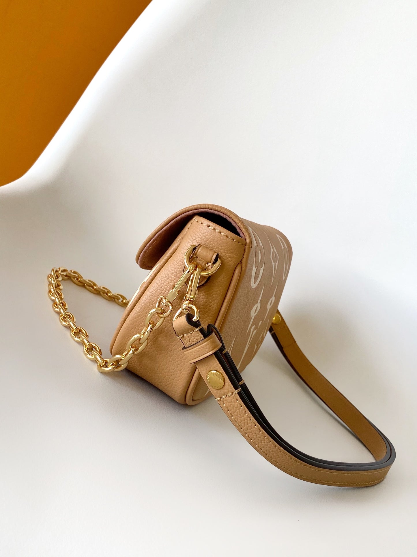 Louis Vuitton Elegant Beige Monogram Leather Crossbody Bag with Gold Chain