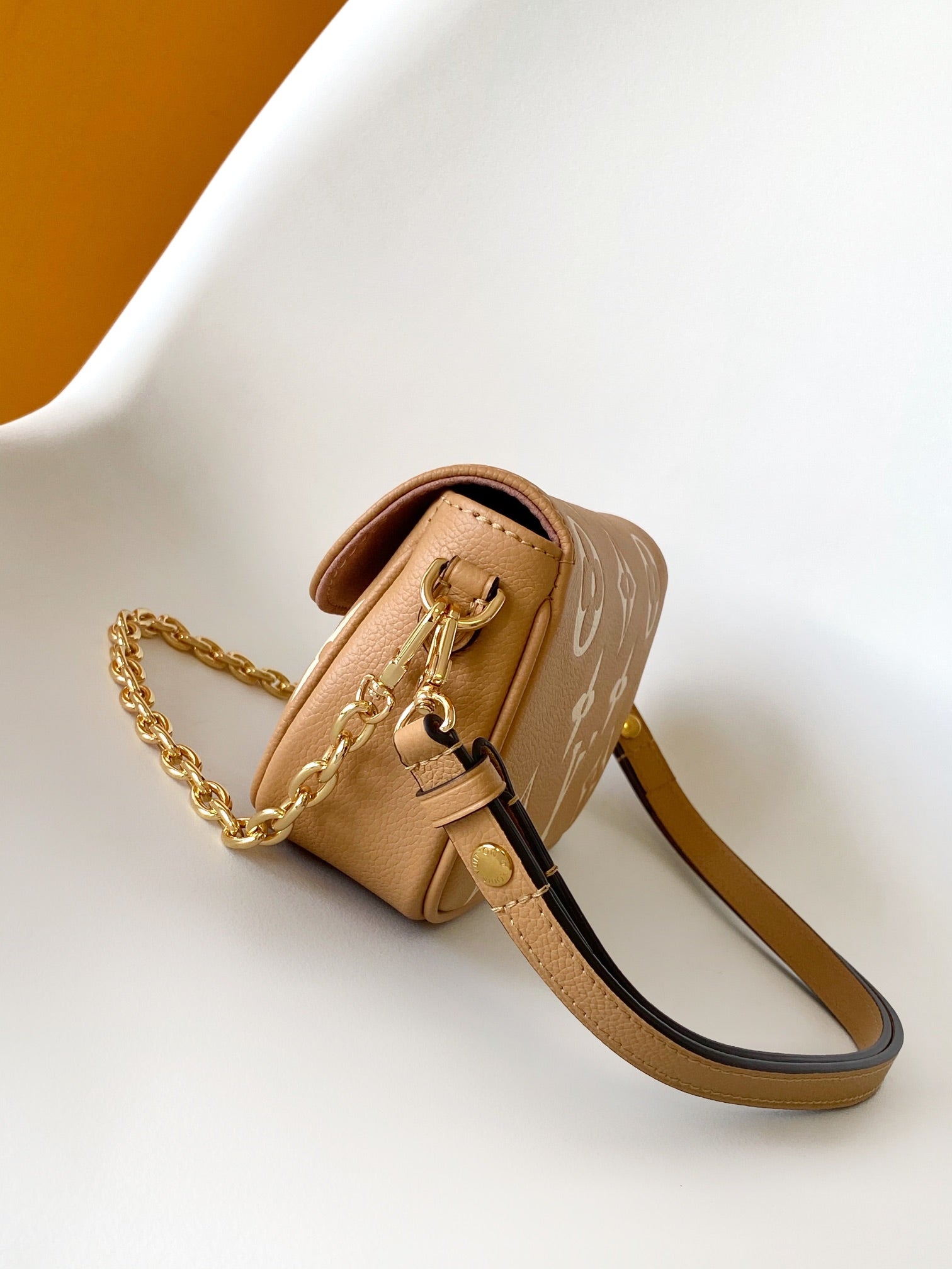 Louis Vuitton Elegant Beige Monogram Leather Crossbody Bag with Gold Chain