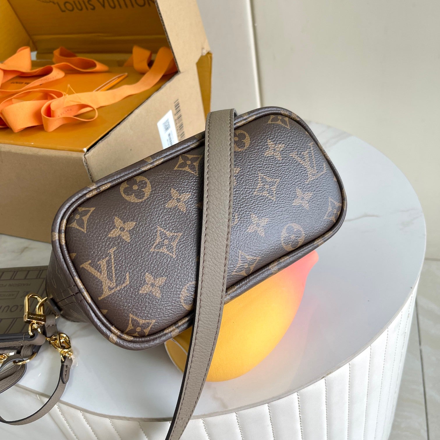 Louis Vuitton Taupe Leather Bucket Handbag with Top Handles and Shoulder Strap