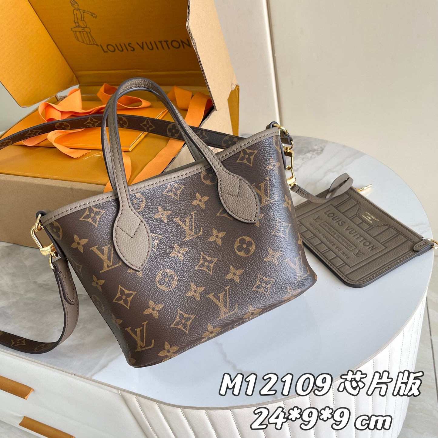 Louis Vuitton Taupe Leather Bucket Handbag with Top Handles and Shoulder Strap