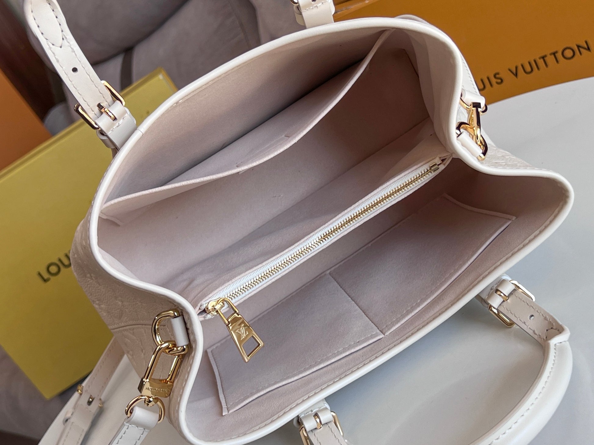 Louis Vuitton Elegant Cream Beige Embossed Leather Tote Bag with Top Handles