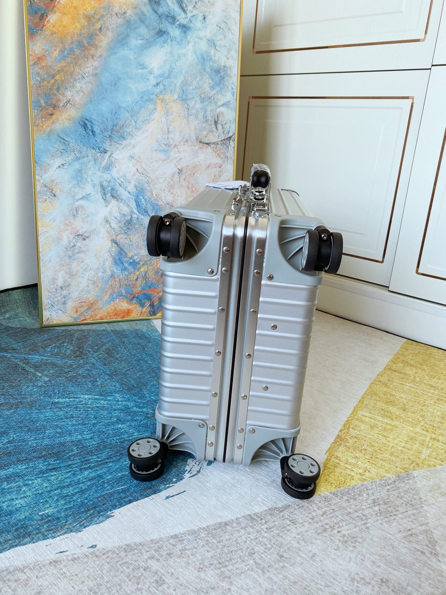 Ribbed Silver Aluminum Carry-On Suitcase with Spinner Wheels