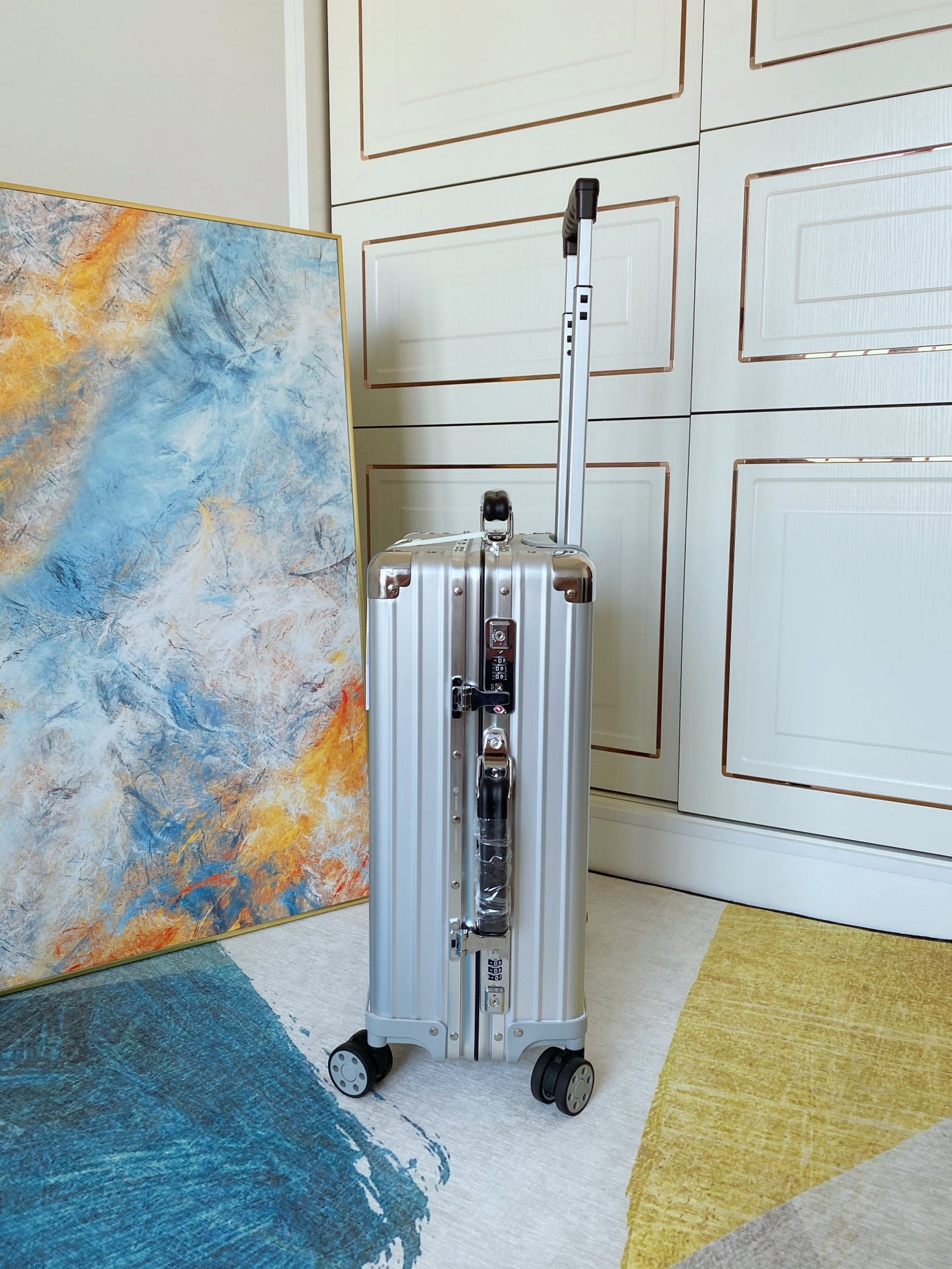 Ribbed Silver Aluminum Carry-On Suitcase with Spinner Wheels