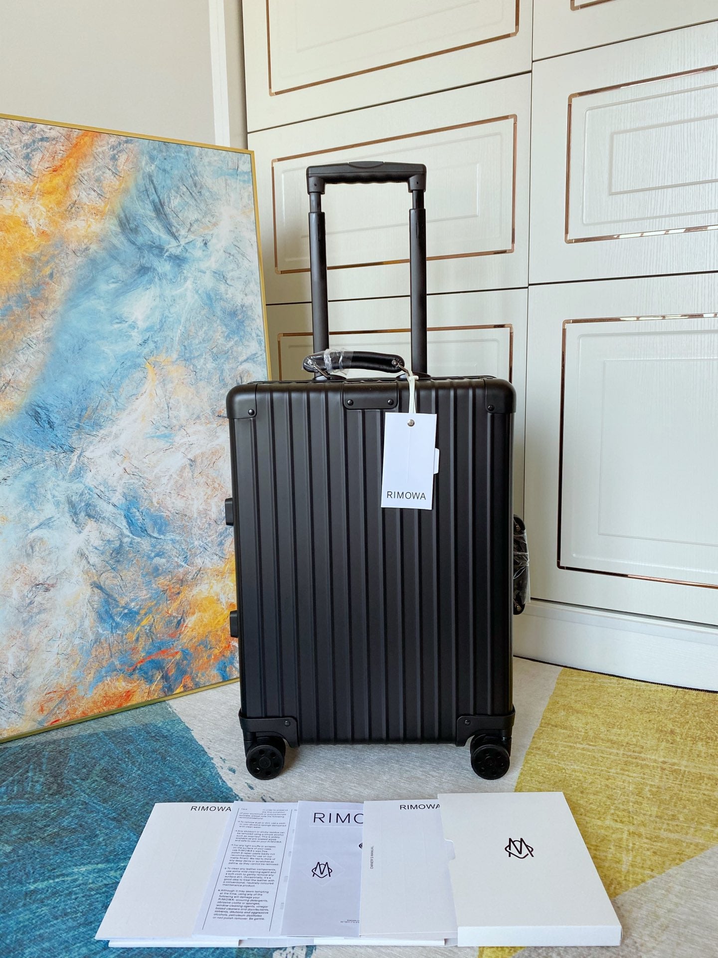 Sleek Matte Black Ribbed Carry-On Hardshell Spinner Suitcase